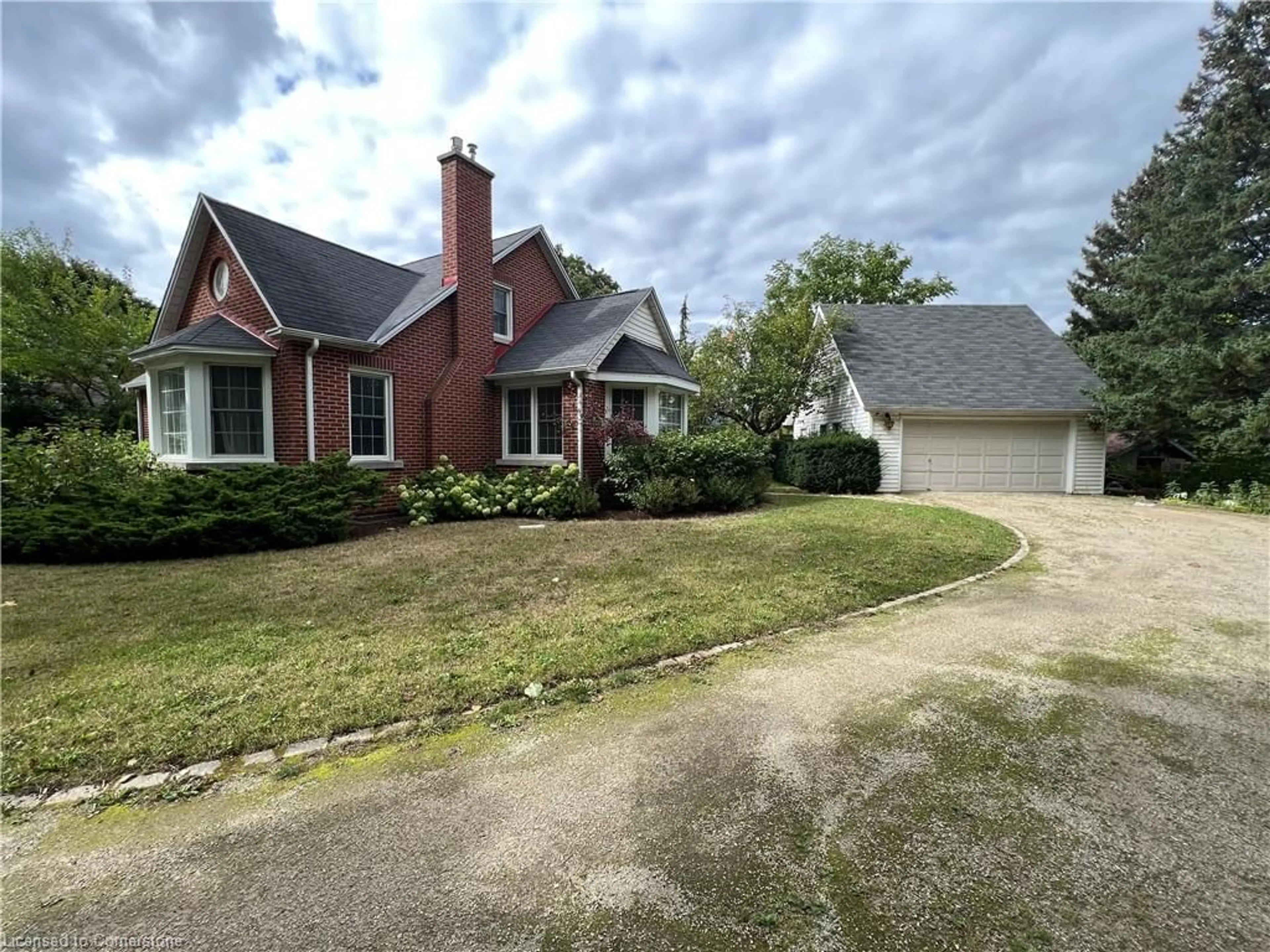 Home with brick exterior material, street for 447 Blue Heron Ridge, Cambridge Ontario N3H 2M6