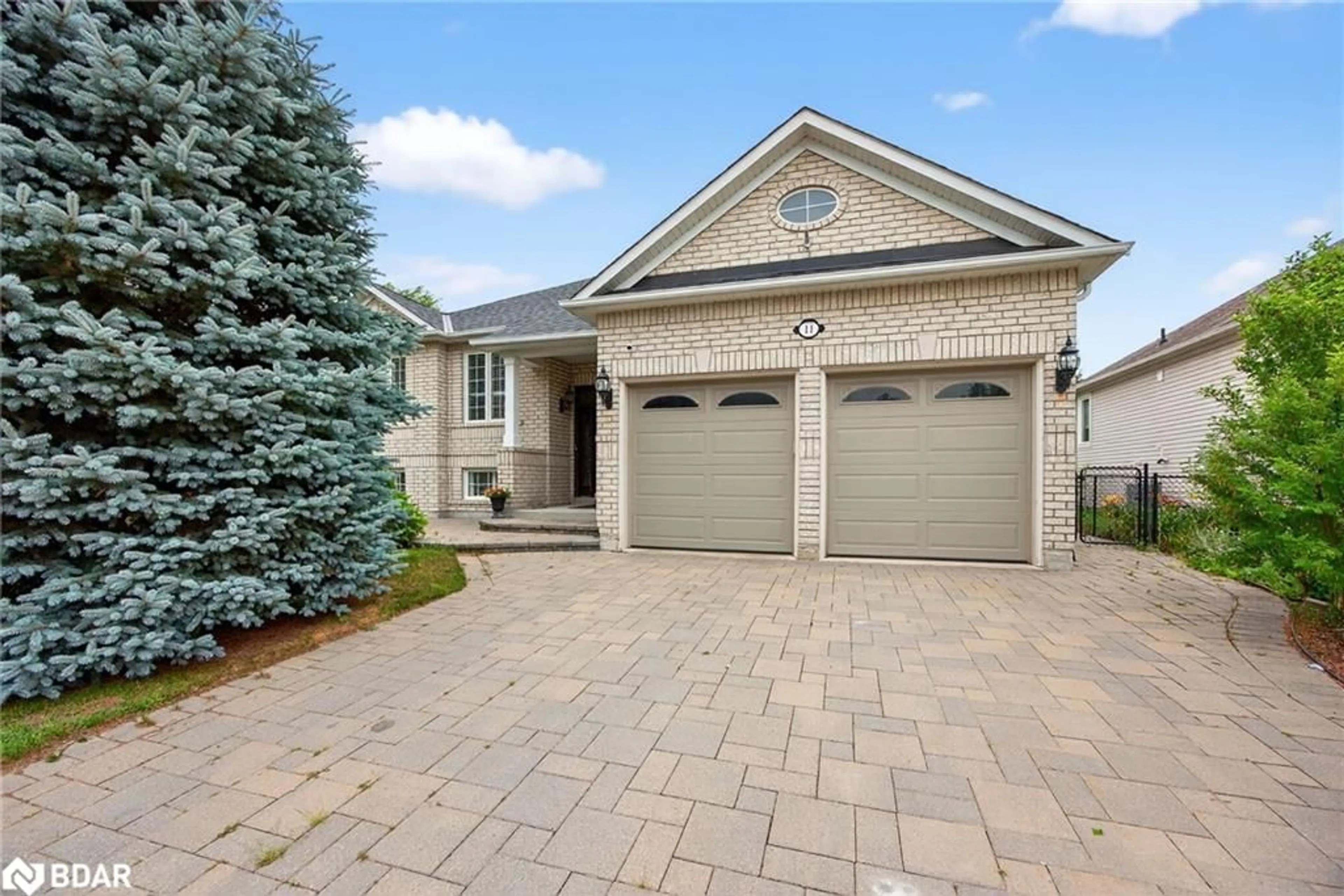 Home with brick exterior material, street for 11 Northwood Dr, Wasaga Beach Ontario L9Z 3B5