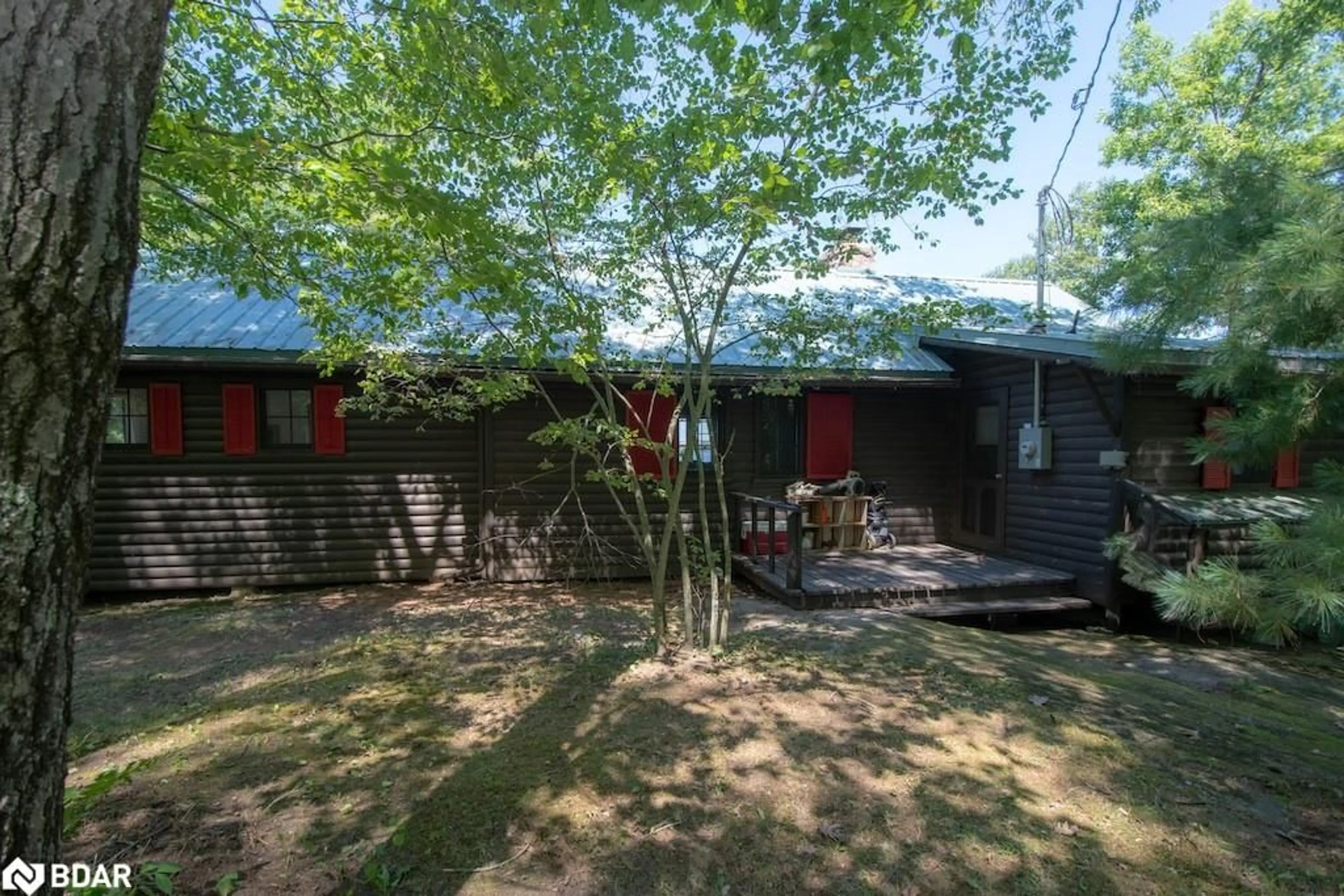 A pic from outside/outdoor area/front of a property/back of a property/a pic from drone, forest/trees view for 144 Kasshabog Lake Island 22, Havelock-Belmont-Methuen Twp Ontario K0L 2H0