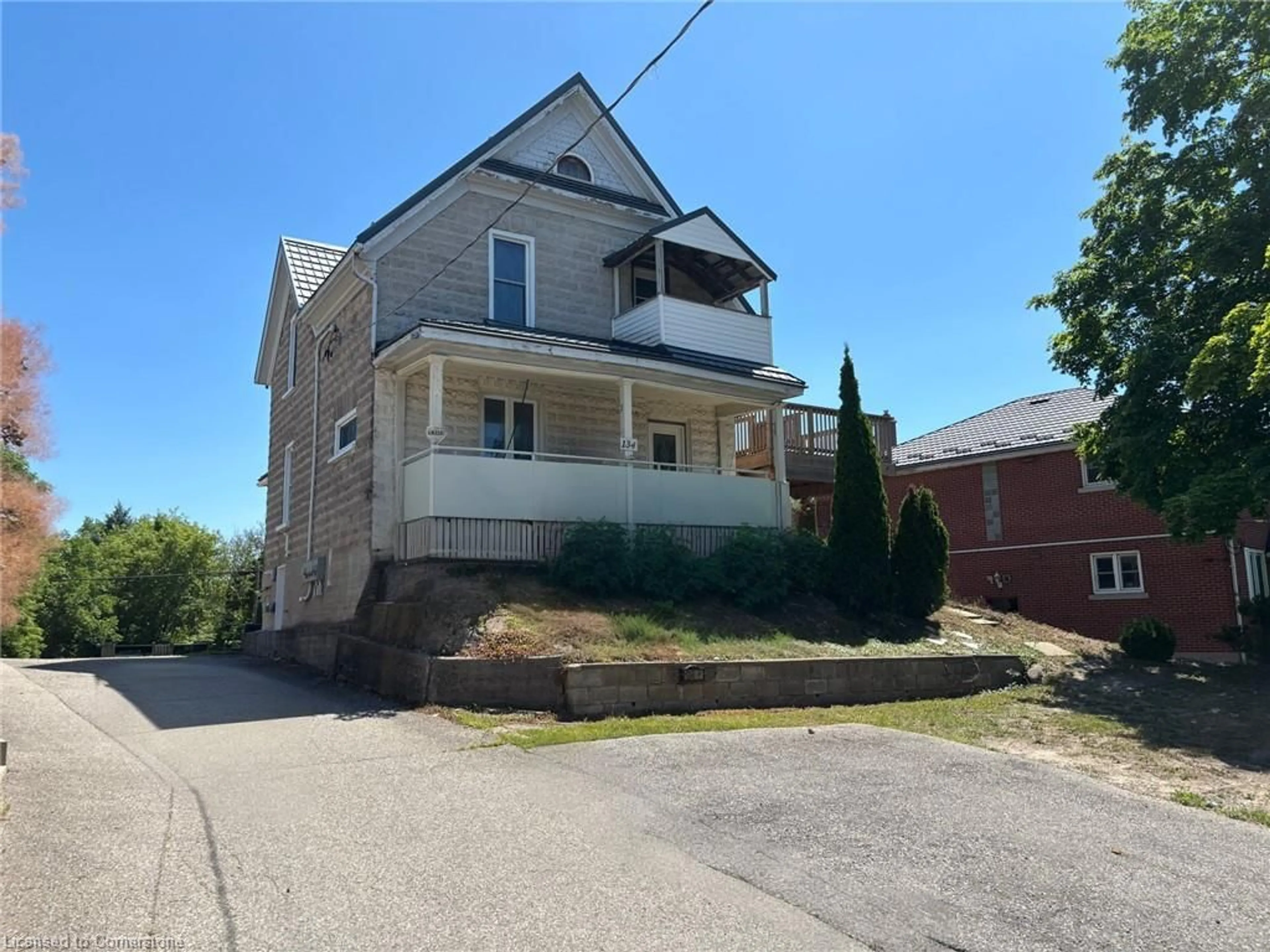 A pic from outside/outdoor area/front of a property/back of a property/a pic from drone, street for 134 Lancaster St, Kitchener Ontario N2H 4T6