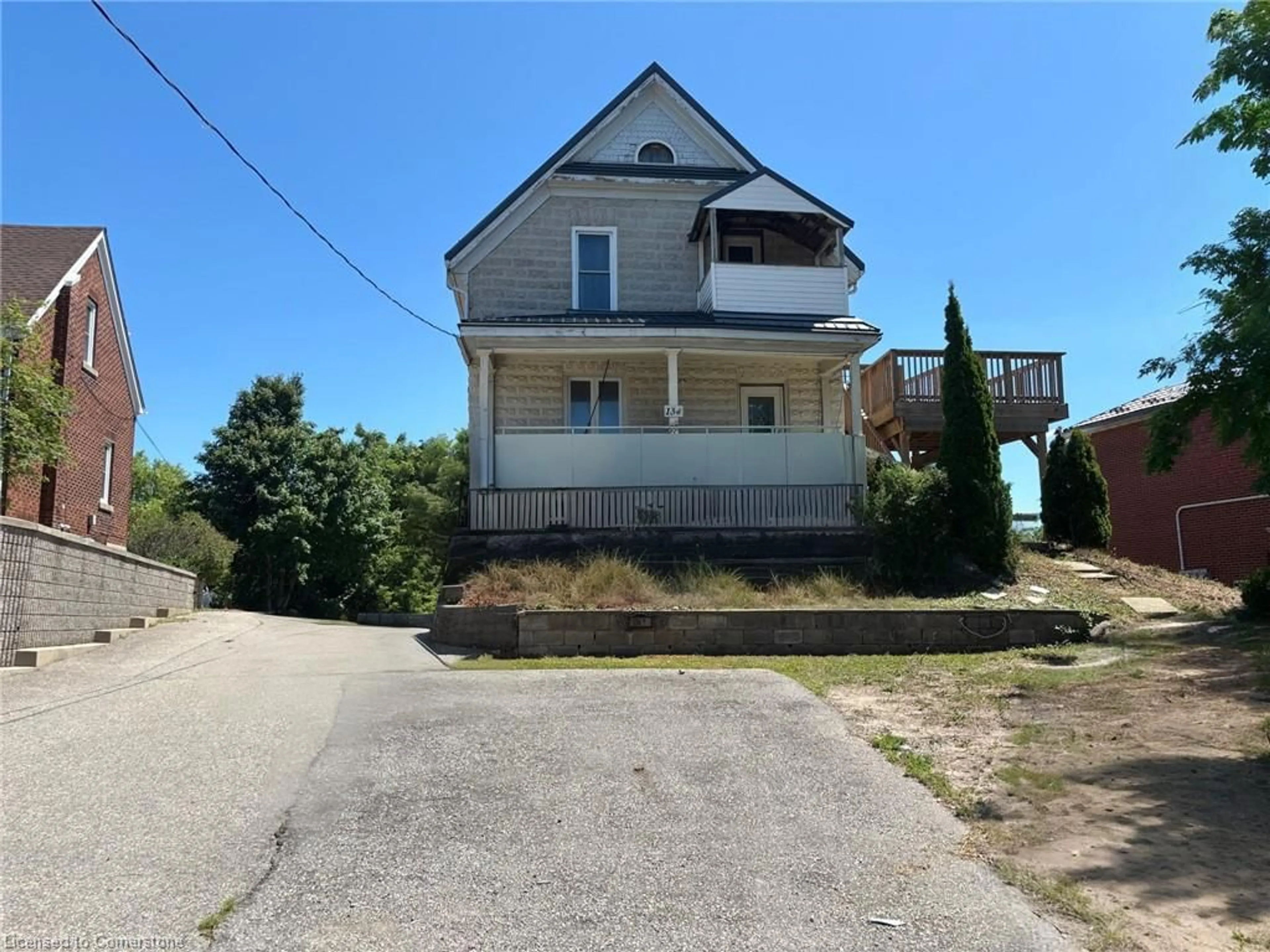 A pic from outside/outdoor area/front of a property/back of a property/a pic from drone, street for 134 Lancaster St, Kitchener Ontario N2H 4T6