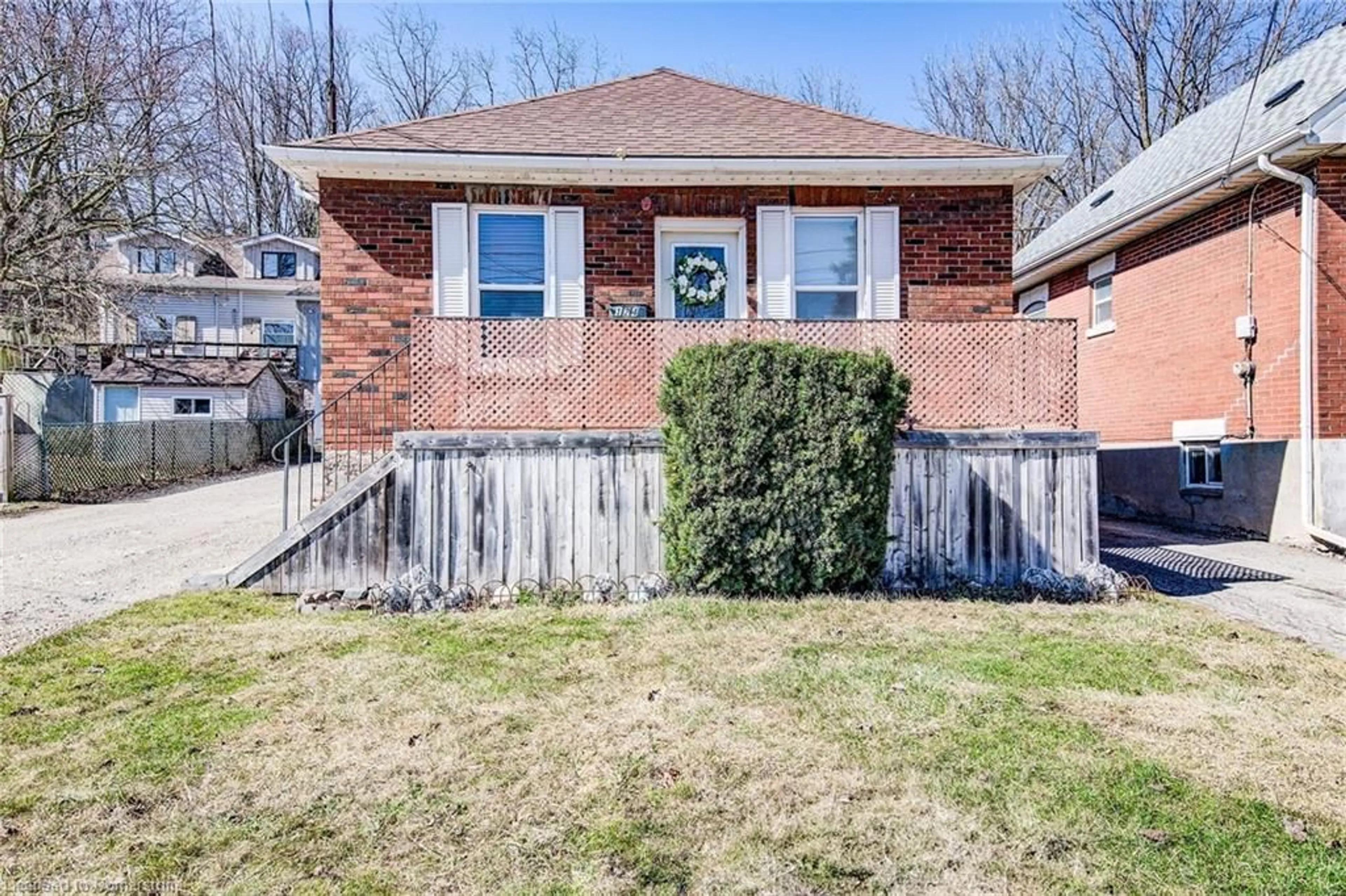 Home with brick exterior material, street for 124 Elizabeth St, Guelph Ontario N1E 2X3