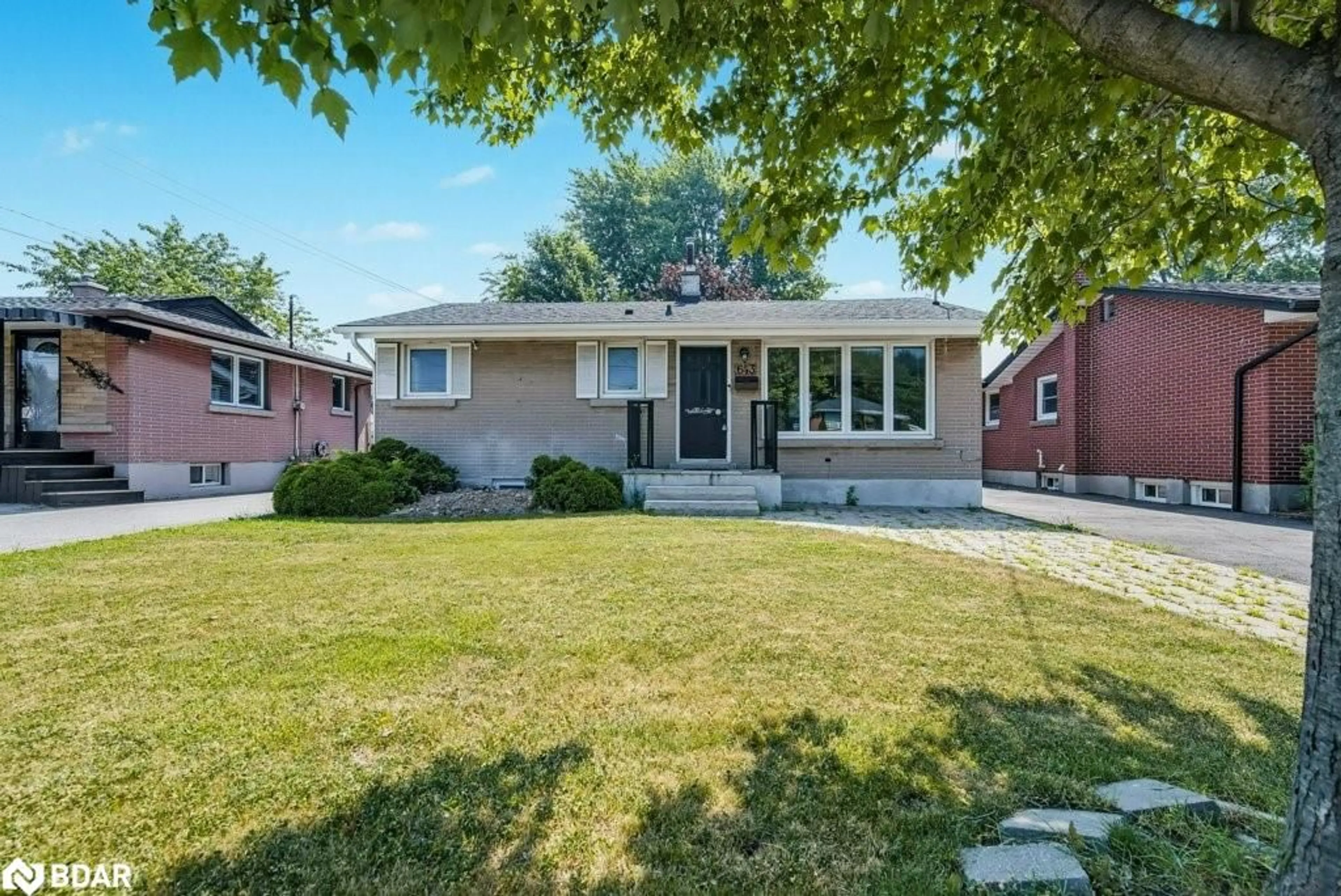 Home with brick exterior material, street for 643 Upper Ottawa St, Hamilton Ontario L8T 3T4