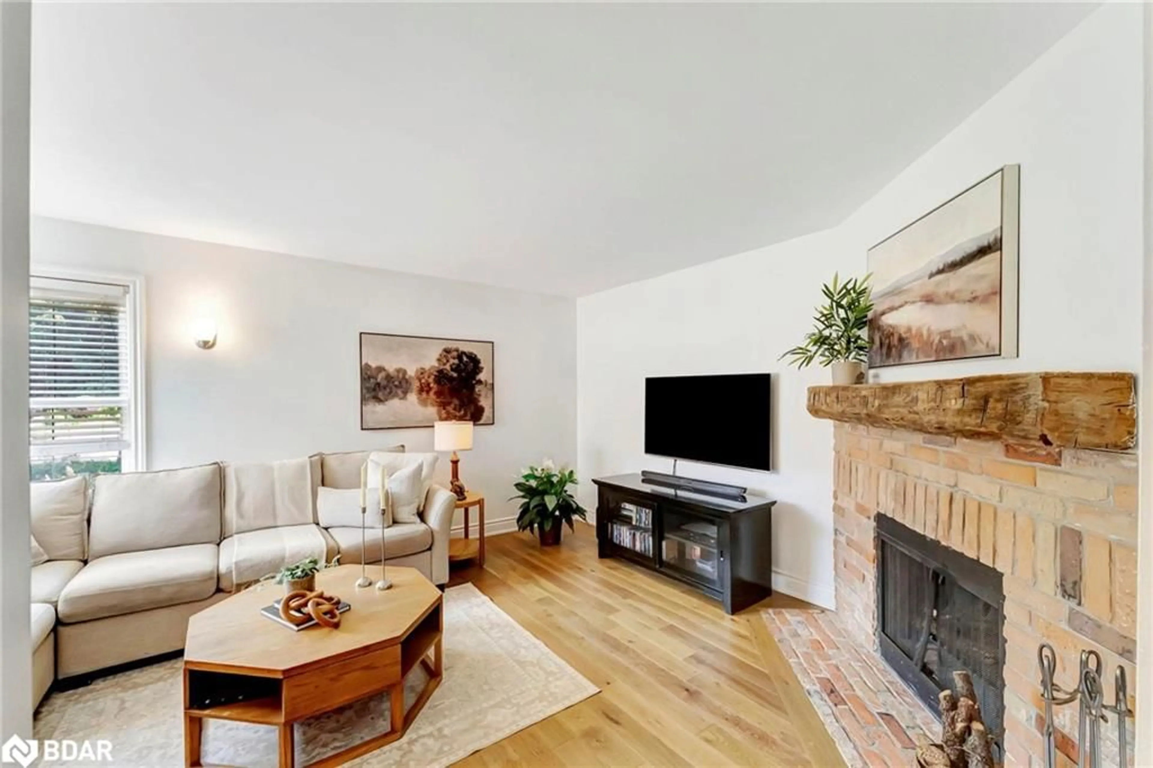 Living room with furniture, wood/laminate floor for 873 Laurier Ave, Milton Ontario L9T 4H4