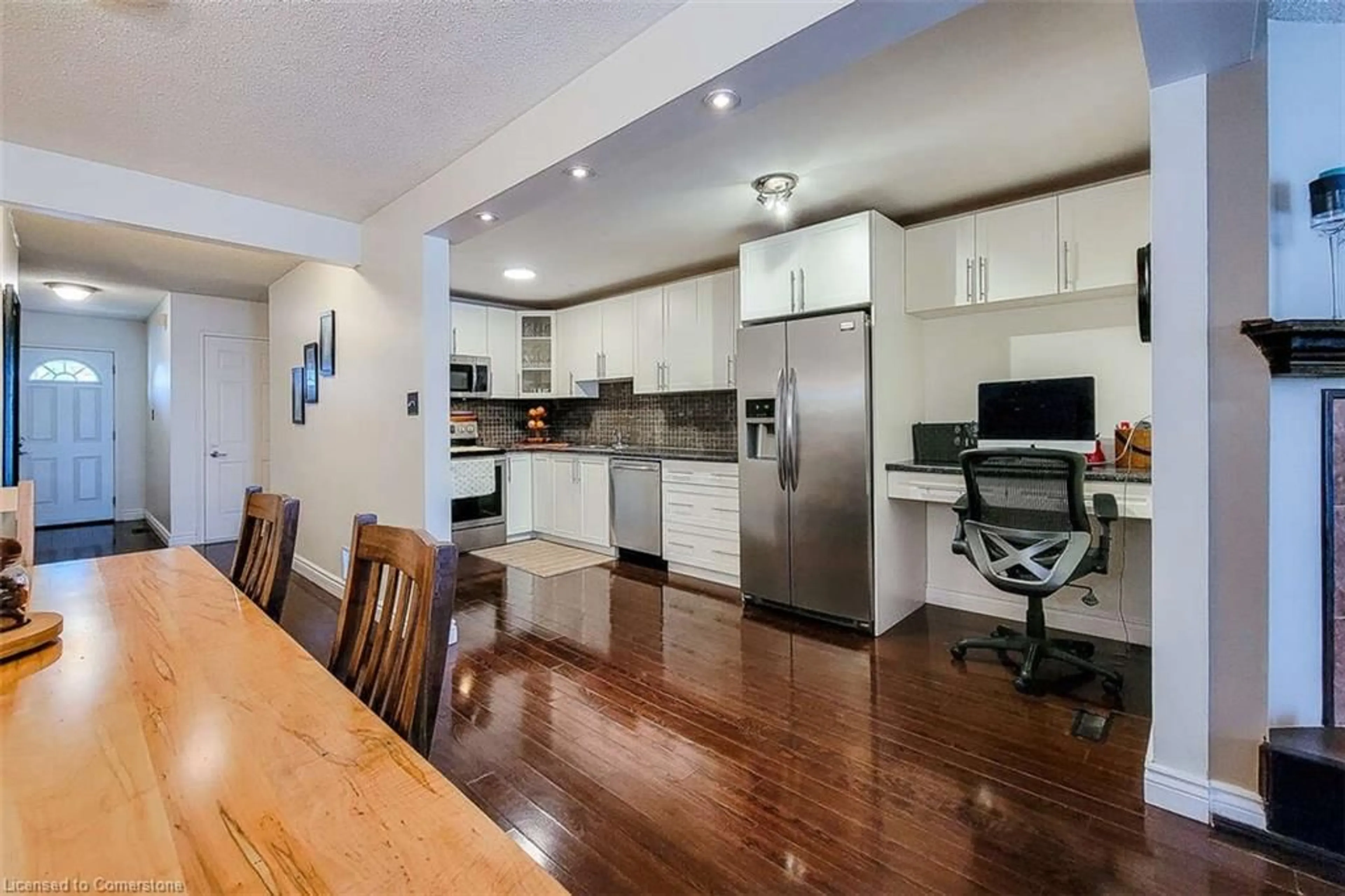 Open concept kitchen, wood/laminate floor for 339 Macintosh Dr, Stoney Creek Ontario L8E 4E1