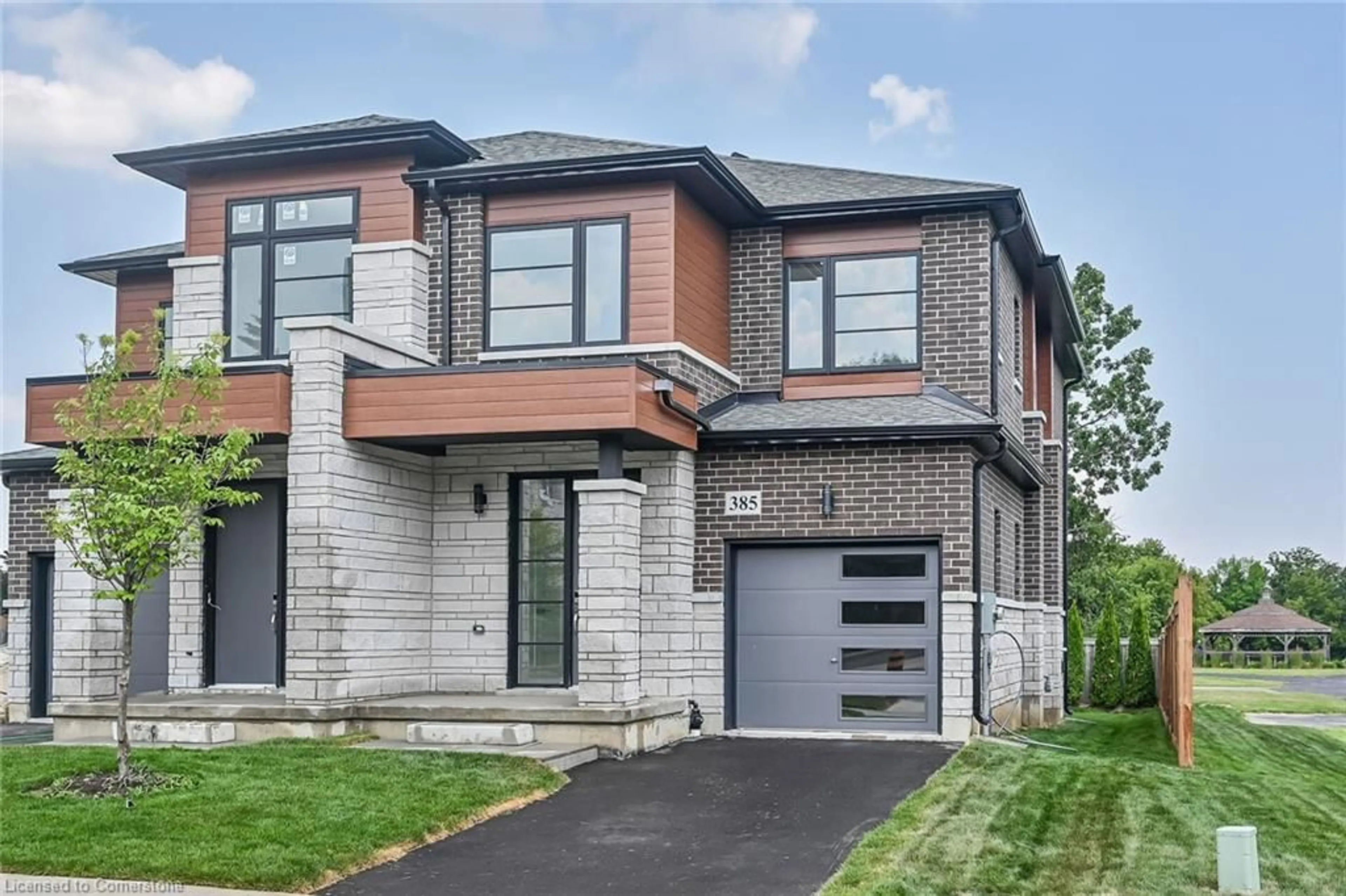 Home with brick exterior material, street for 385 Limeridge Rd, Hamilton Ontario L9A 5A4