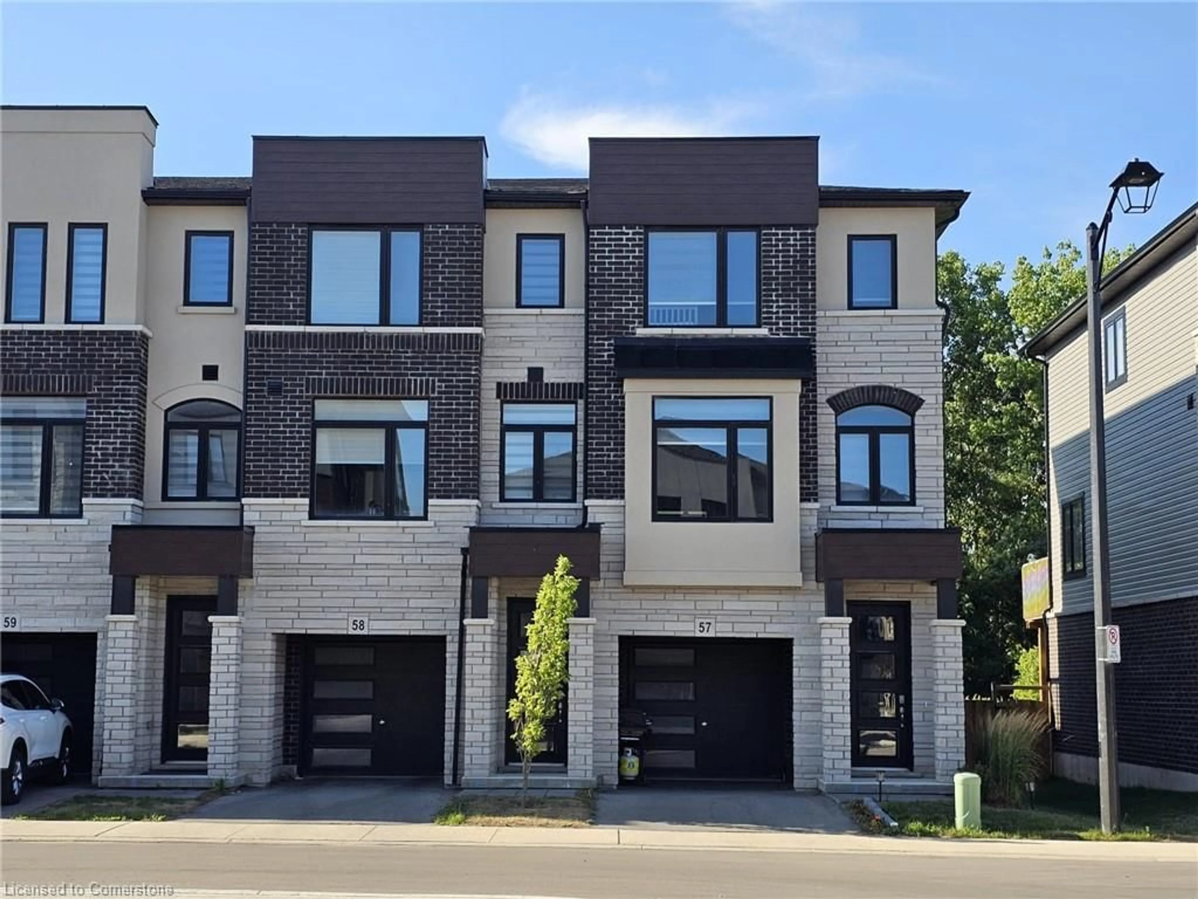 Home with brick exterior material, street for 290 Equestrian Way #58, Cambridge Ontario N3E 0E7