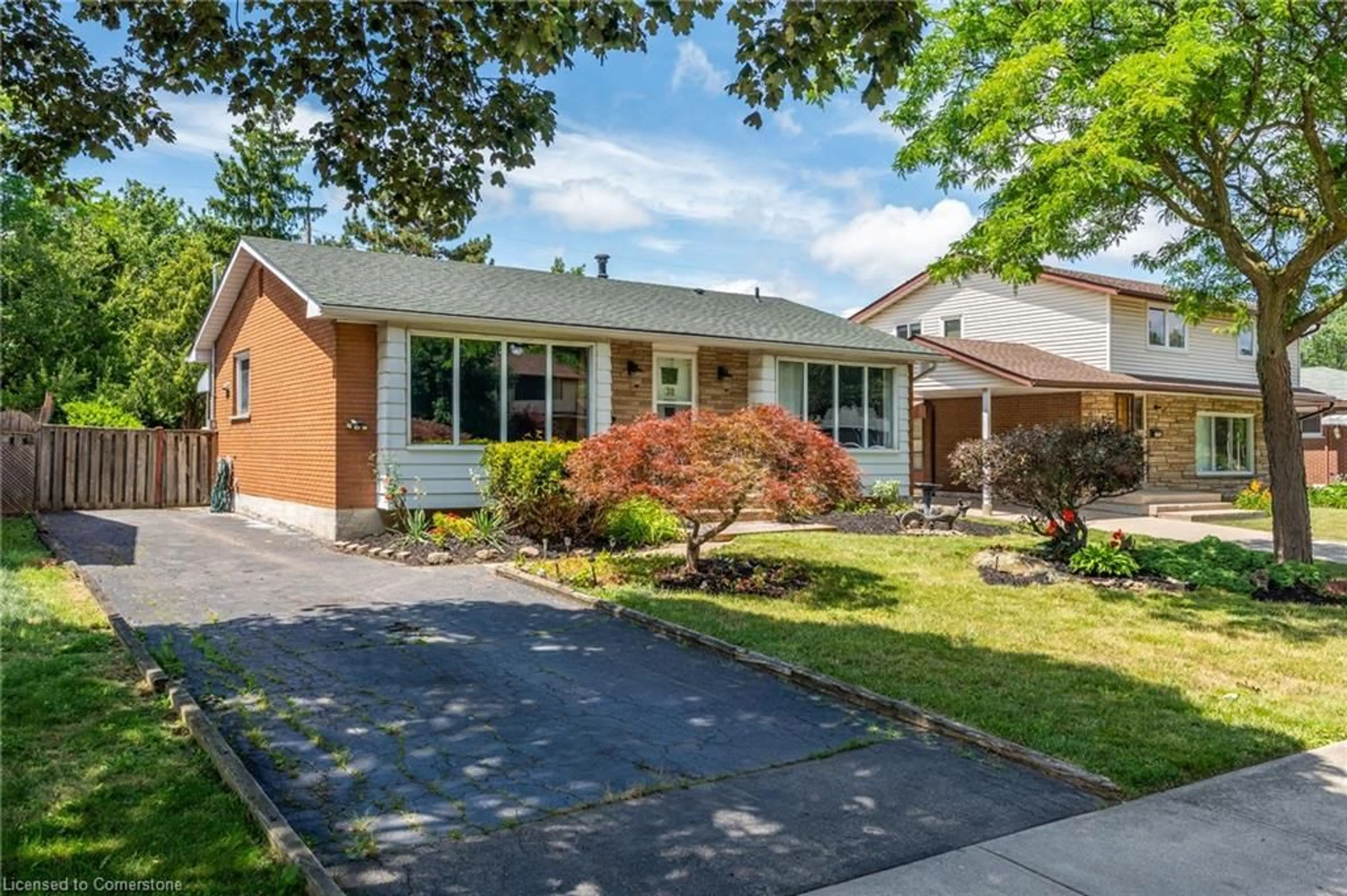 Home with brick exterior material, street for 38 Goldfinch Rd, Hamilton Ontario L9A 3W7
