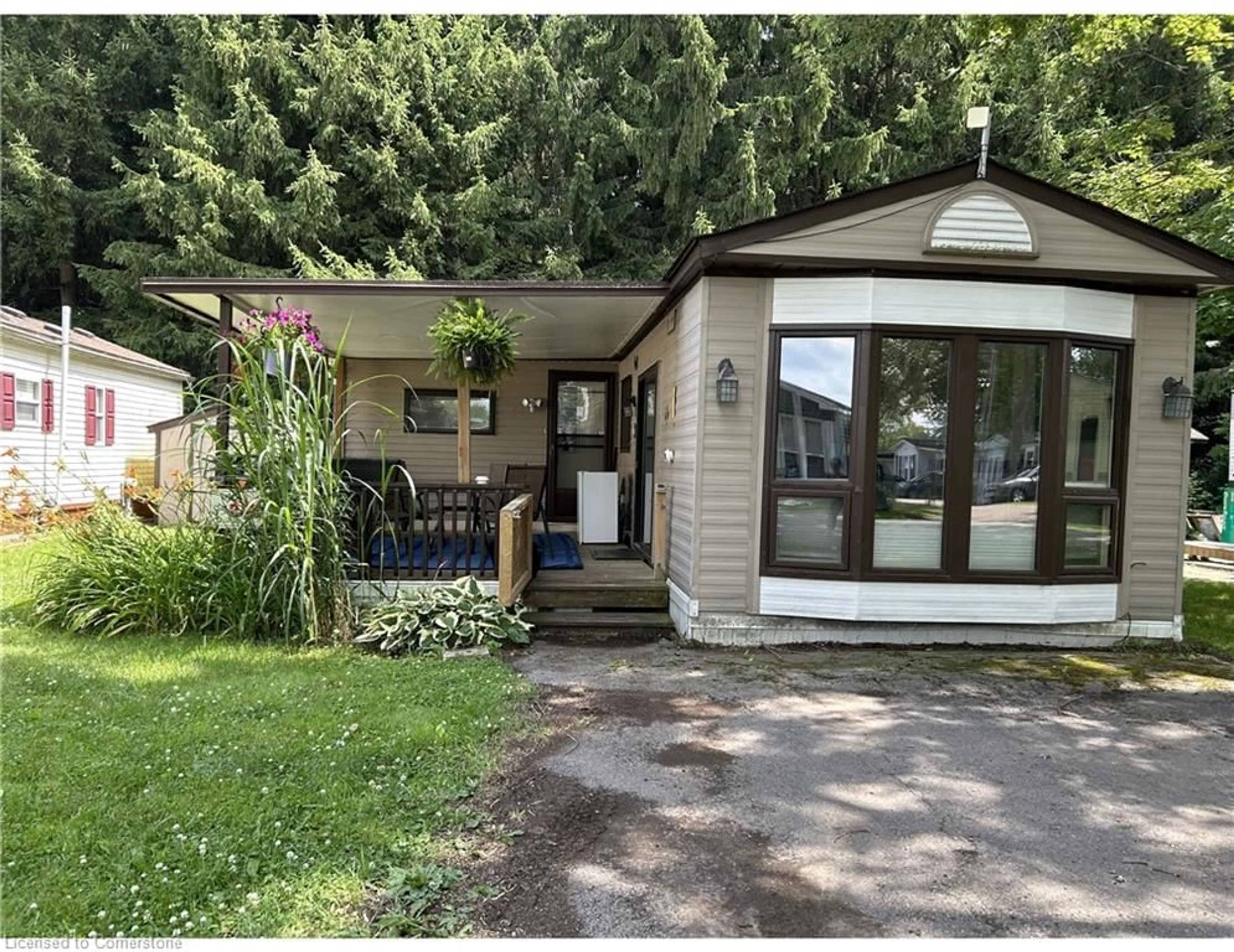 Home with vinyl exterior material, street for 580 Beaver Creek Rd #206, Waterloo Ontario N2J 3Z4