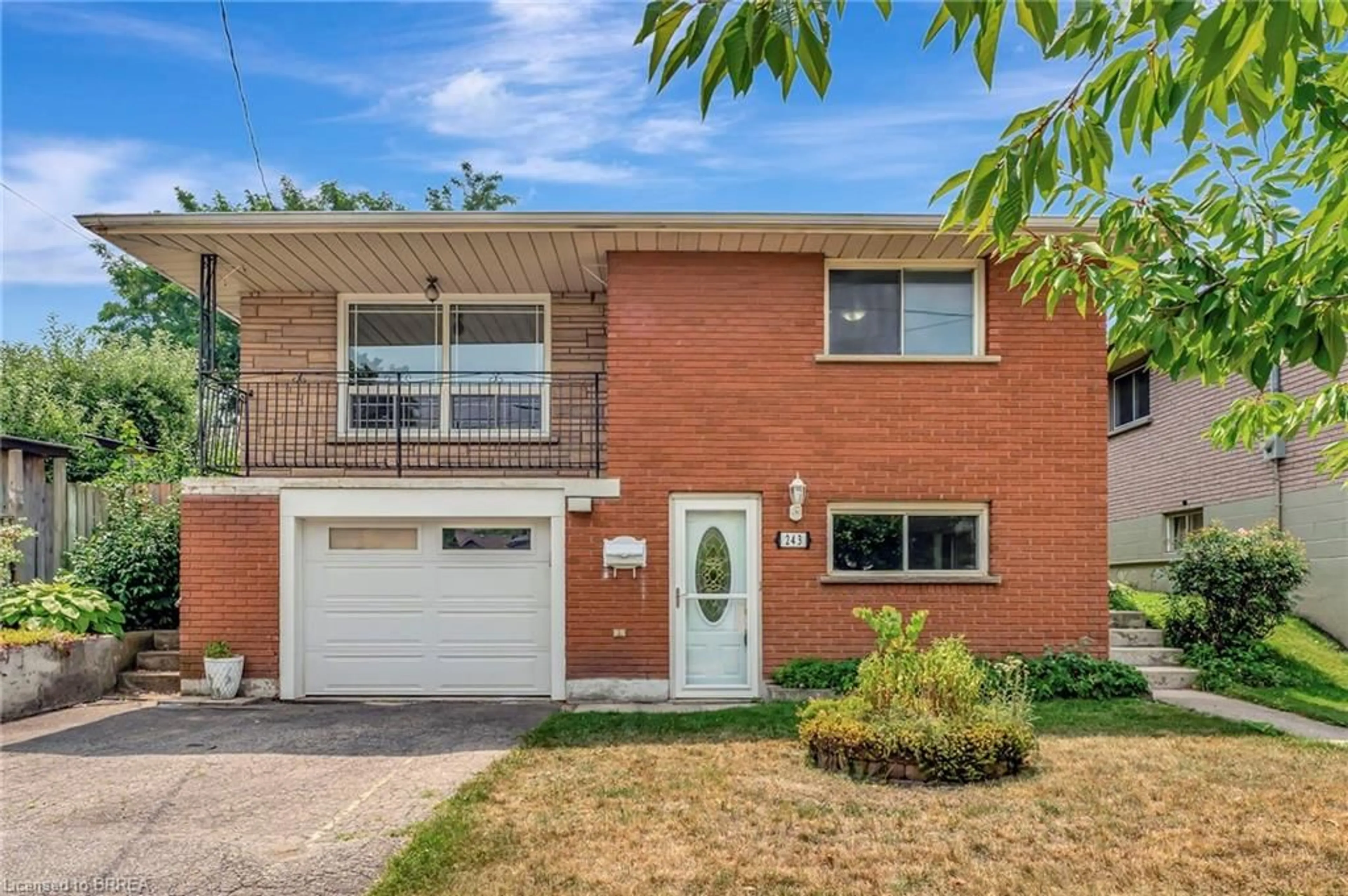 Home with brick exterior material, street for 243 Wellington St, Brantford Ontario N3S 3Z6