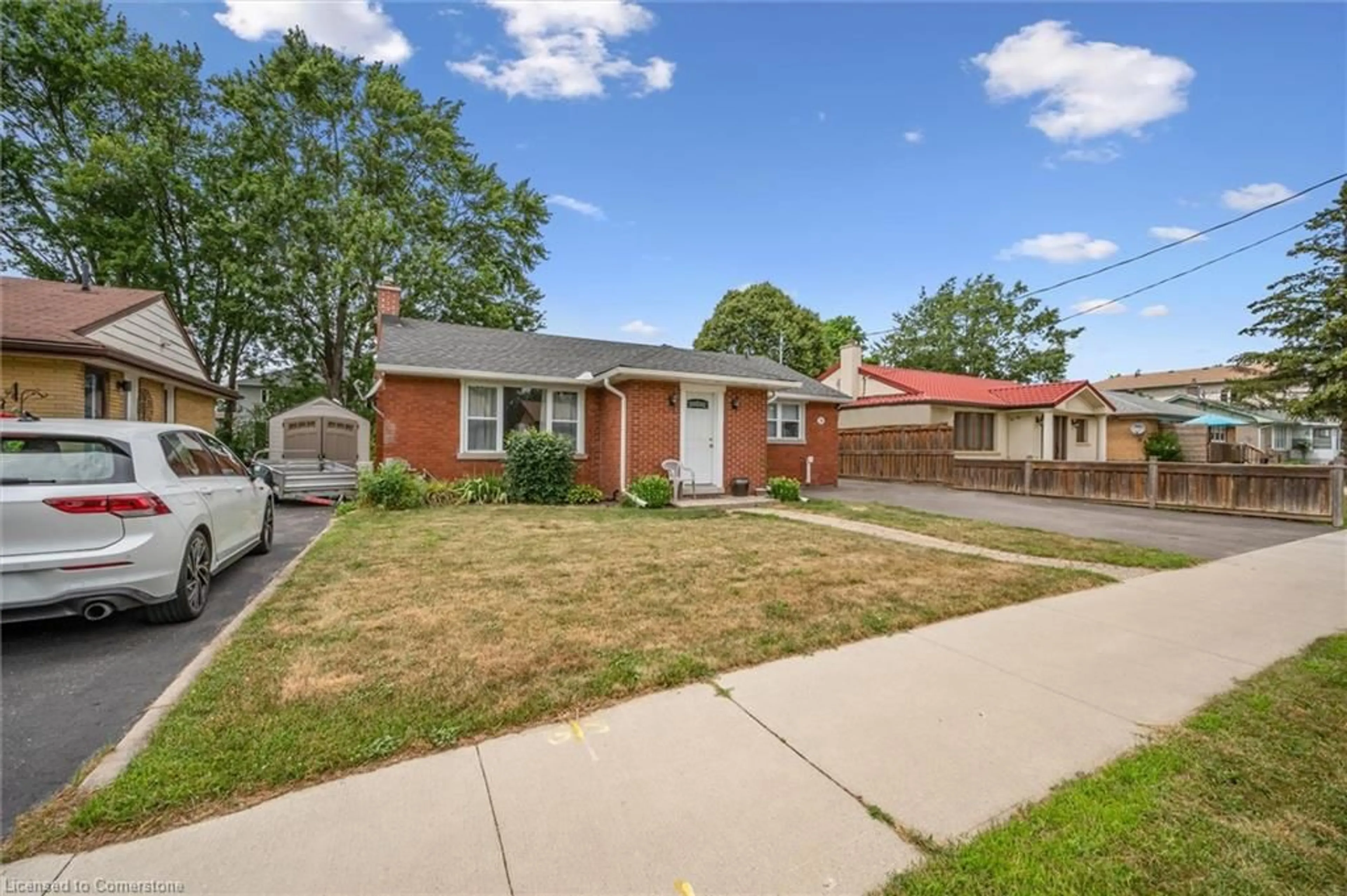 Home with brick exterior material, street for 76 Third Ave, Kitchener Ontario N2C 1N6