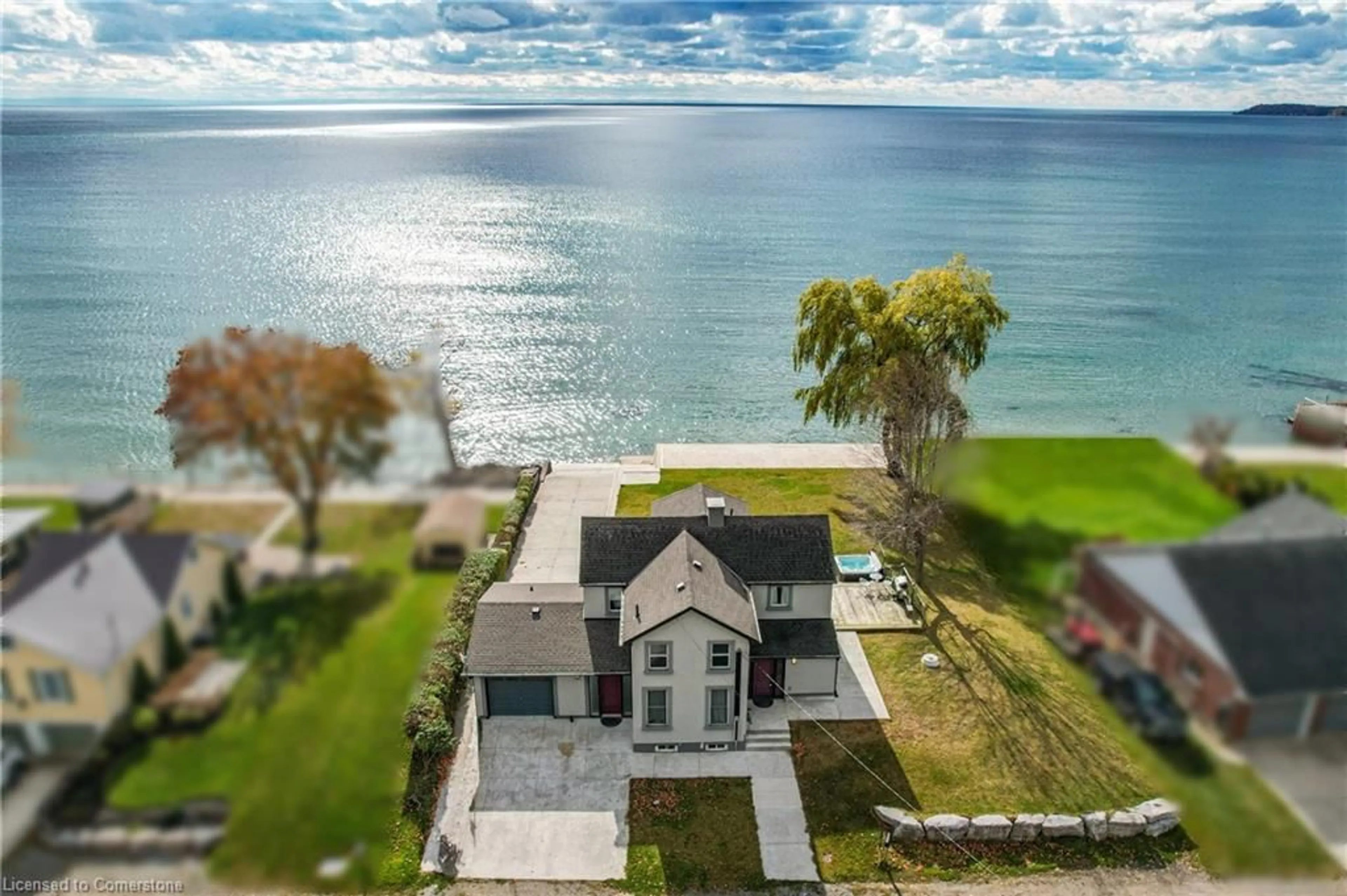 A pic from outside/outdoor area/front of a property/back of a property/a pic from drone, water/lake/river/ocean view for 2952 North Shore Dr, Lowbanks Ontario N0A 1K0