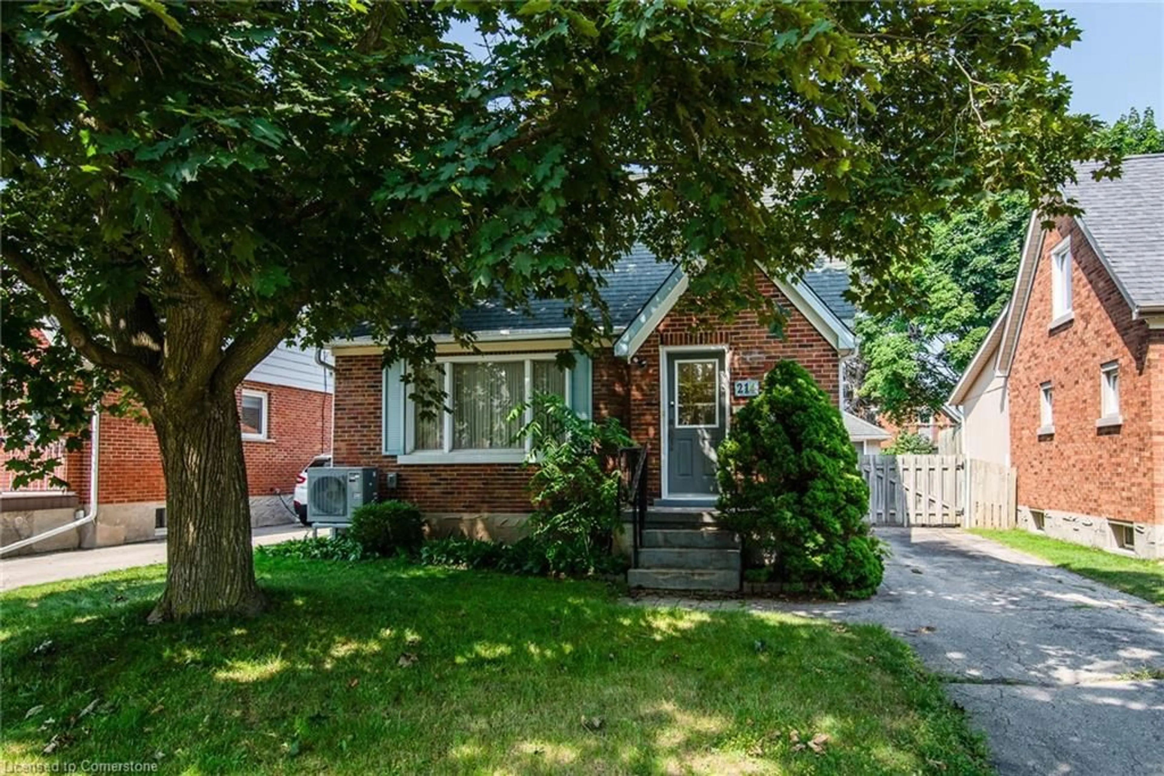 Home with brick exterior material, street for 214 Dundas Ave, Kitchener Ontario N2G 2Z4