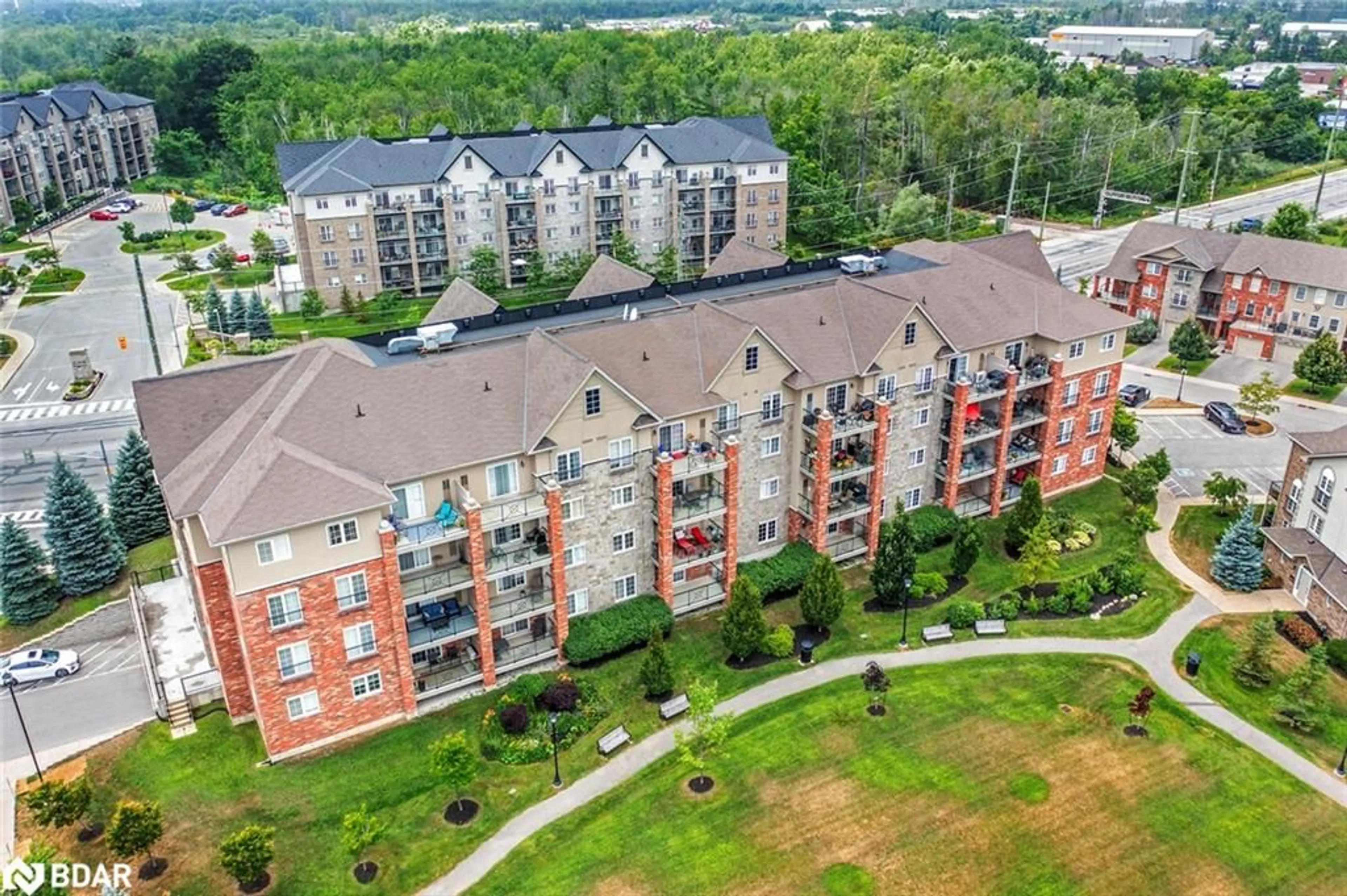 A pic from outside/outdoor area/front of a property/back of a property/a pic from drone, city buildings view from balcony for 43 Ferndale Dr #209, Barrie Ontario L4N 5W6