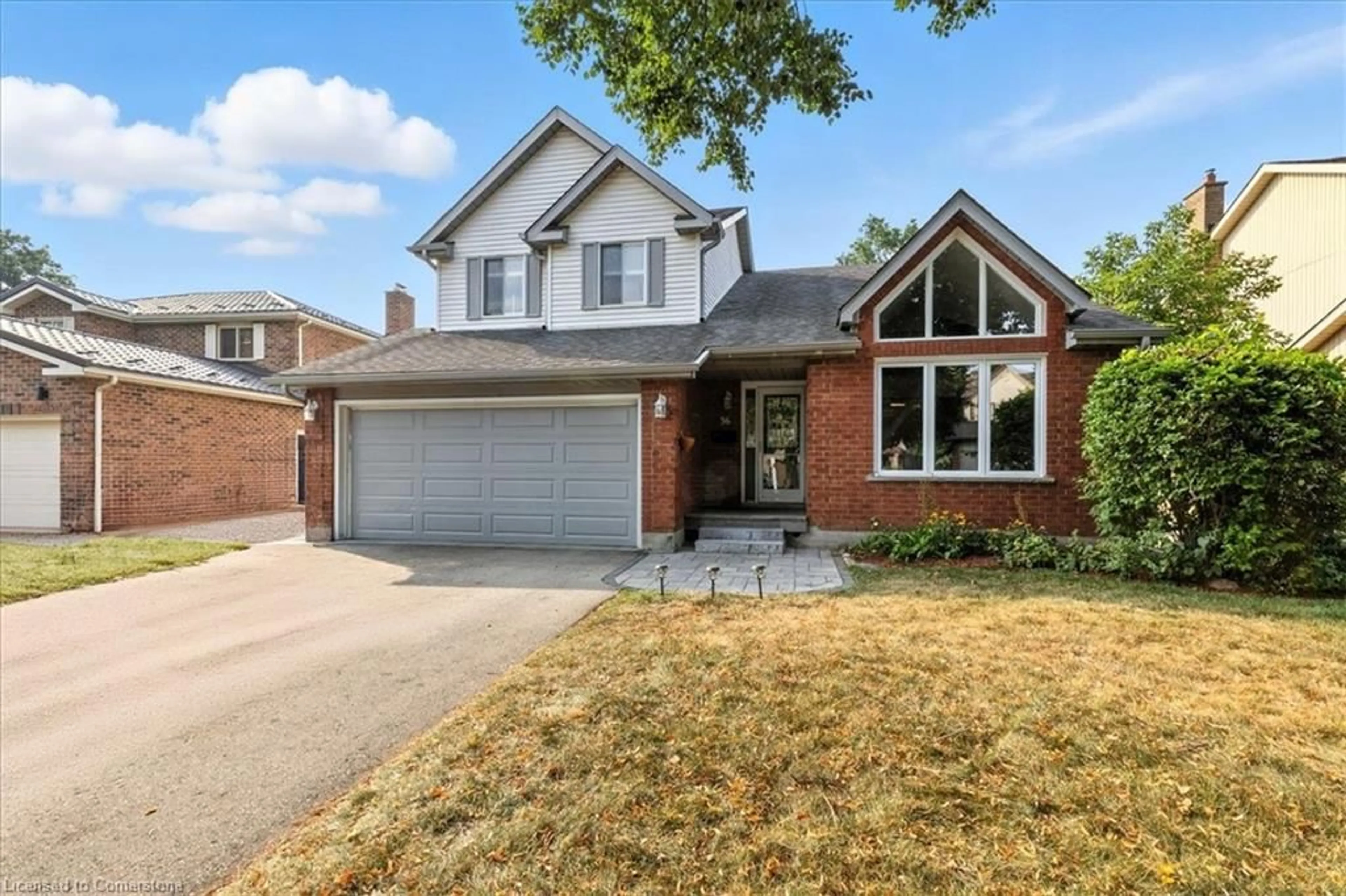Home with brick exterior material, street for 36 Notchwood Crt, Kitchener Ontario N2A 3L6