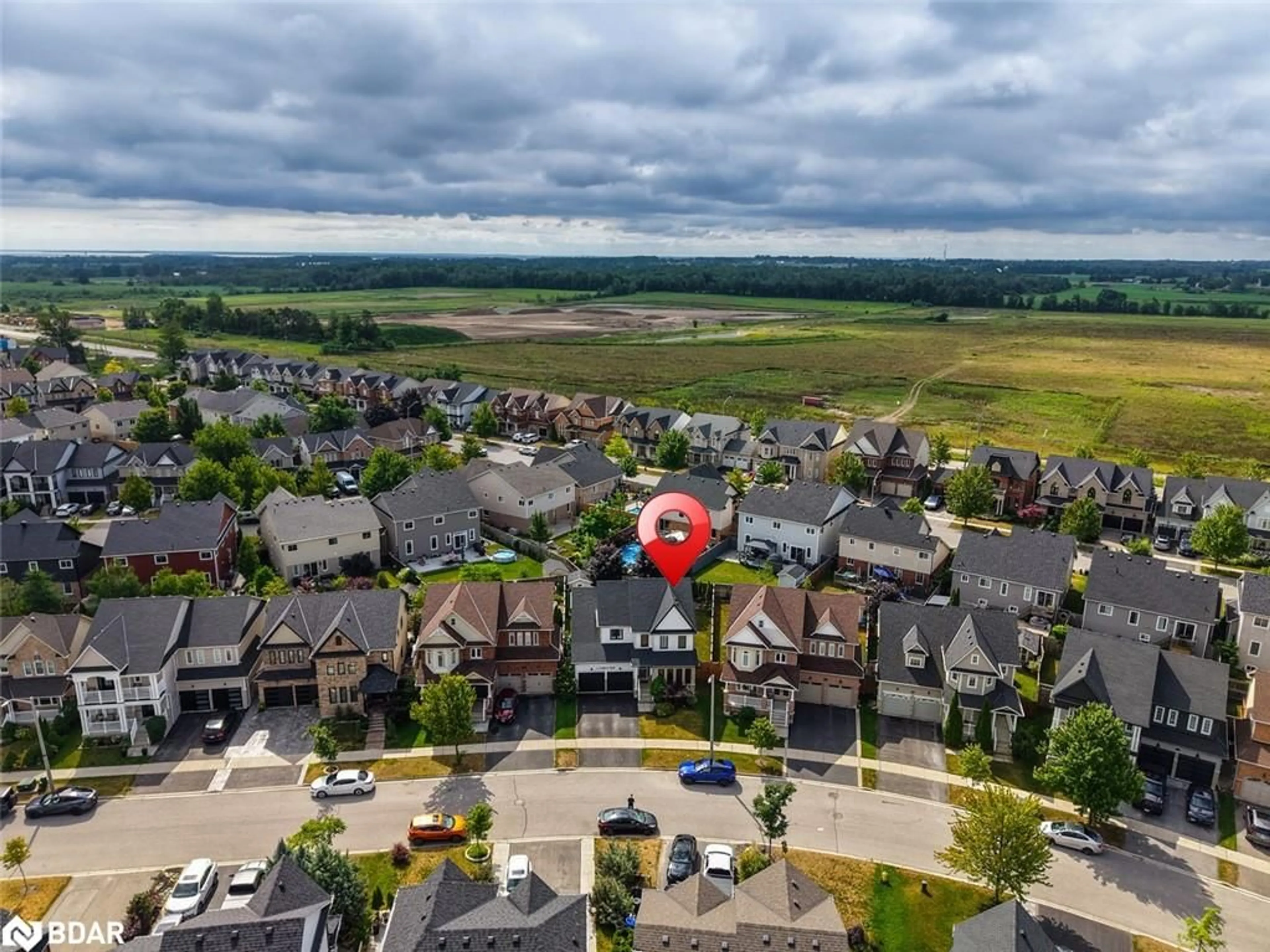 A pic from outside/outdoor area/front of a property/back of a property/a pic from drone, mountain view for 13 Counsellor Terr, Barrie Ontario L4M 7H1