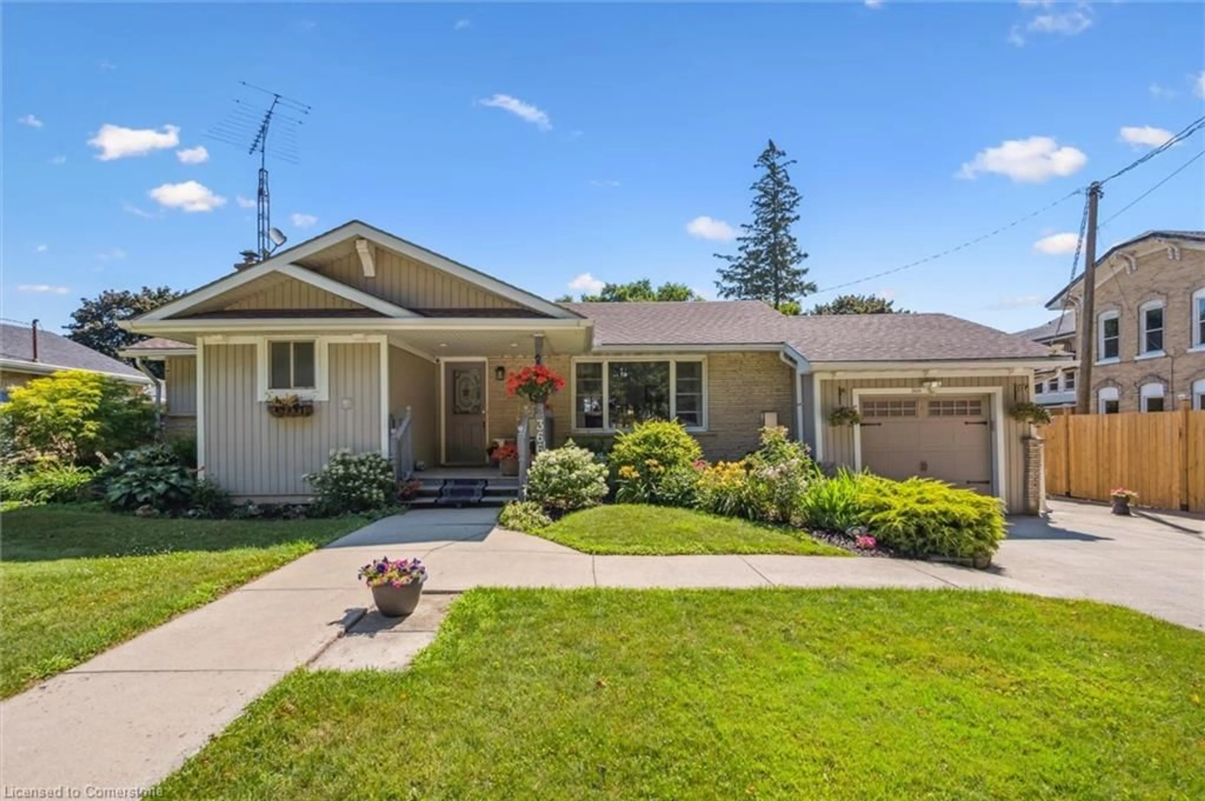 Home with vinyl exterior material, street for 366 Peel St, Mount Forest Ontario N0G 2L3