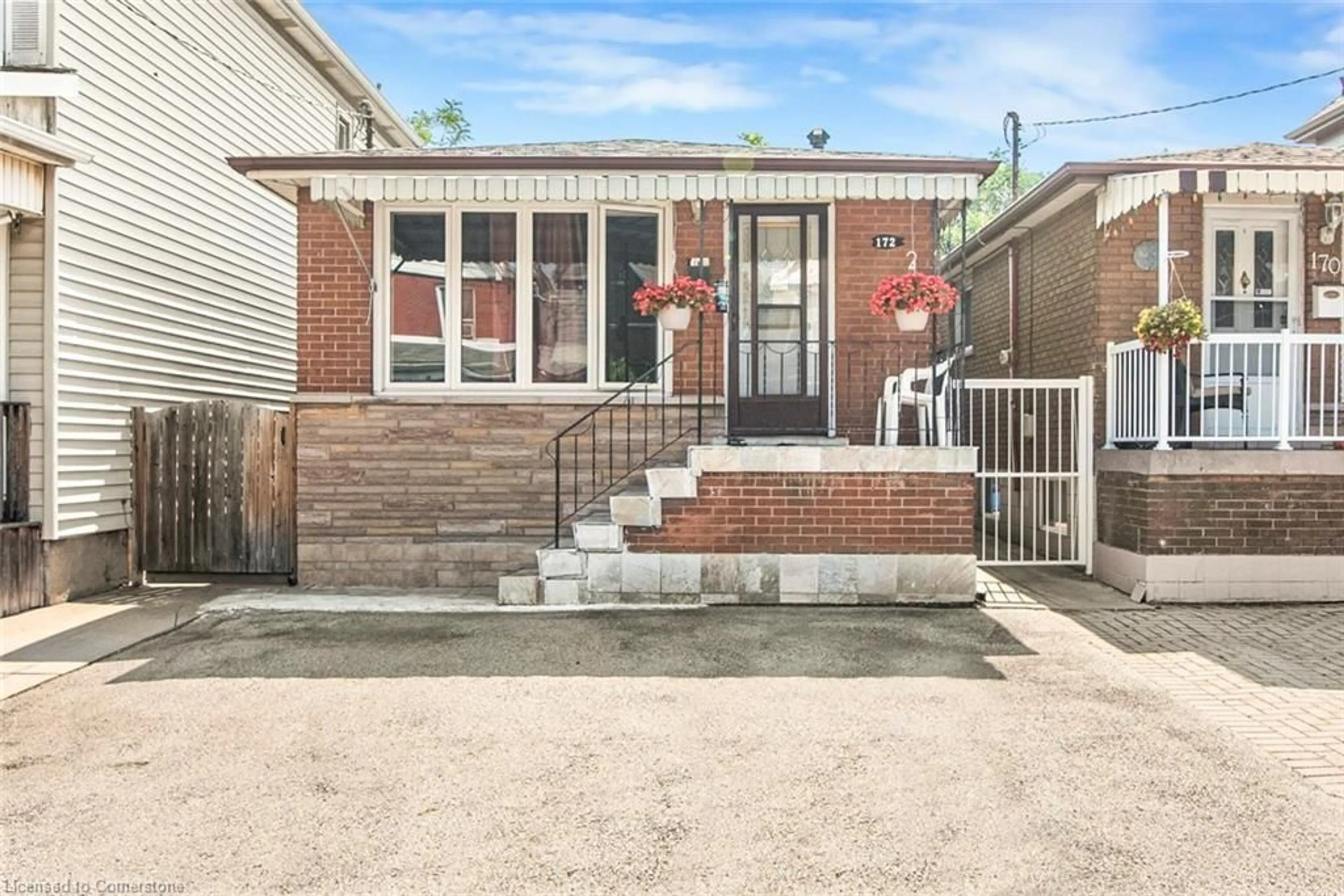 Home with brick exterior material, street for 172 Gibson Ave, Hamilton Ontario L8L 6J8