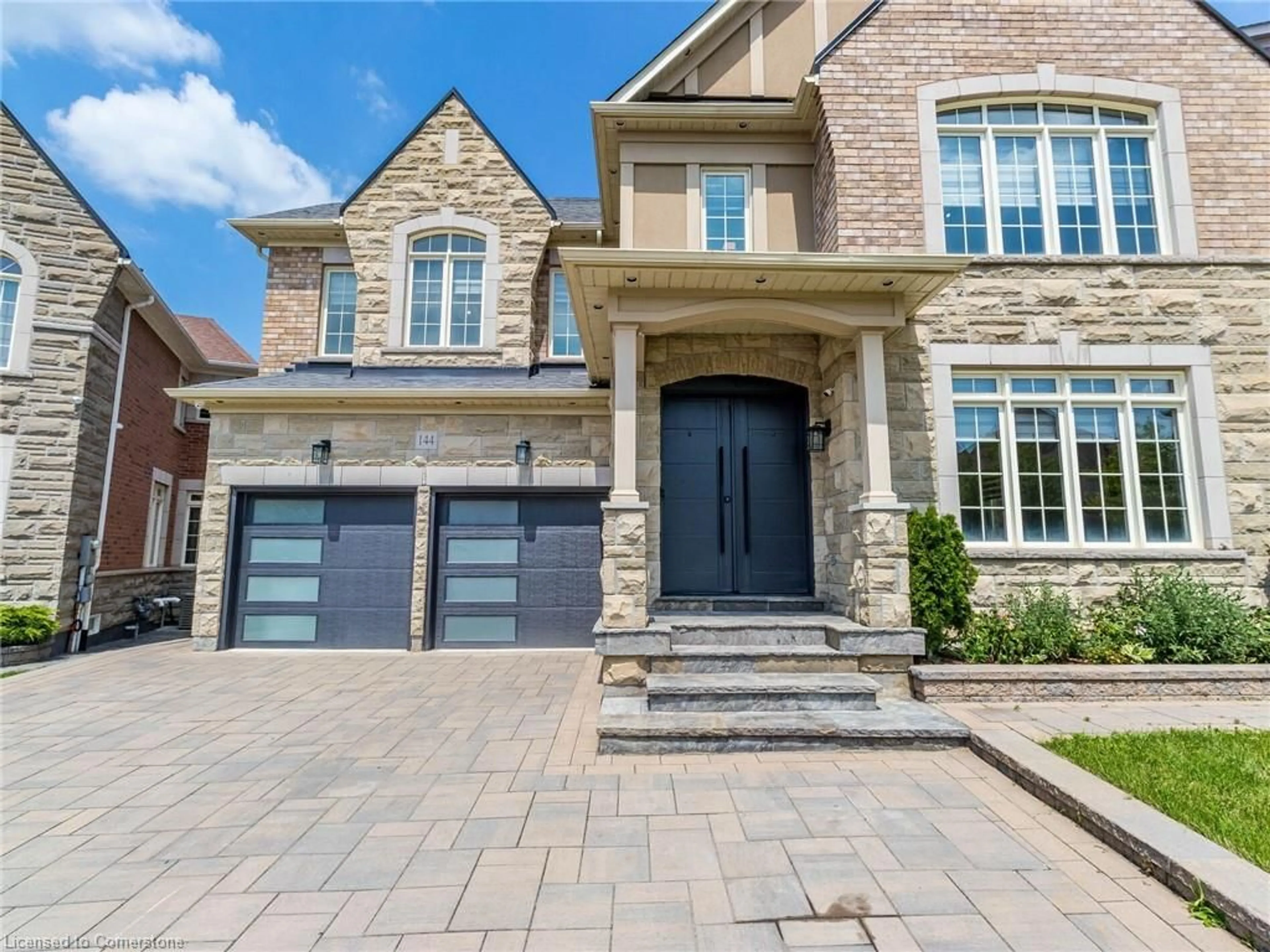 Home with brick exterior material, street for 144 Bloomsbury Ave, Brampton Ontario L6P 2X2