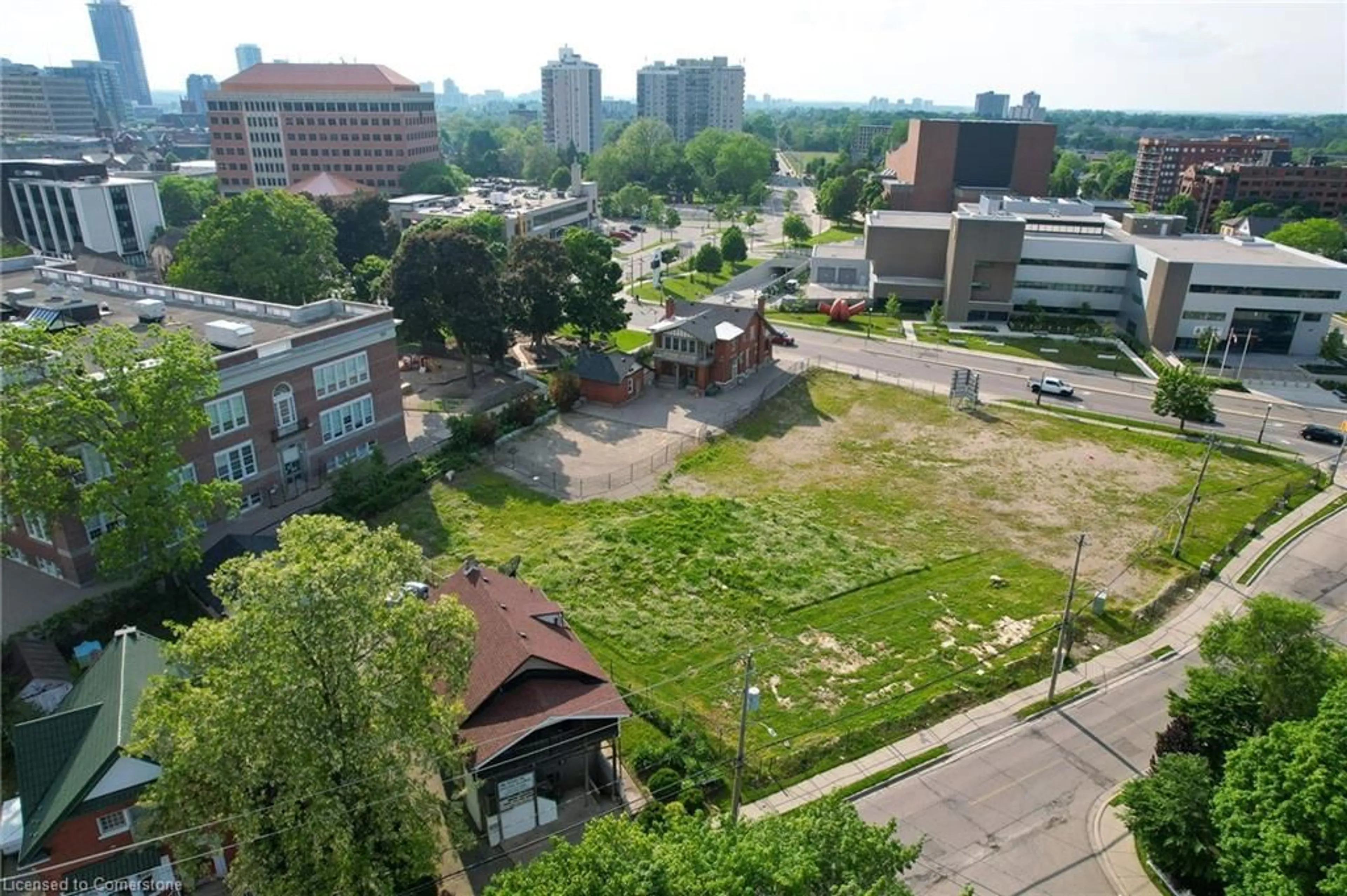 A pic from outside/outdoor area/front of a property/back of a property/a pic from drone, unknown for 151 Lancaster St, Kitchener Ontario N2H 1M9