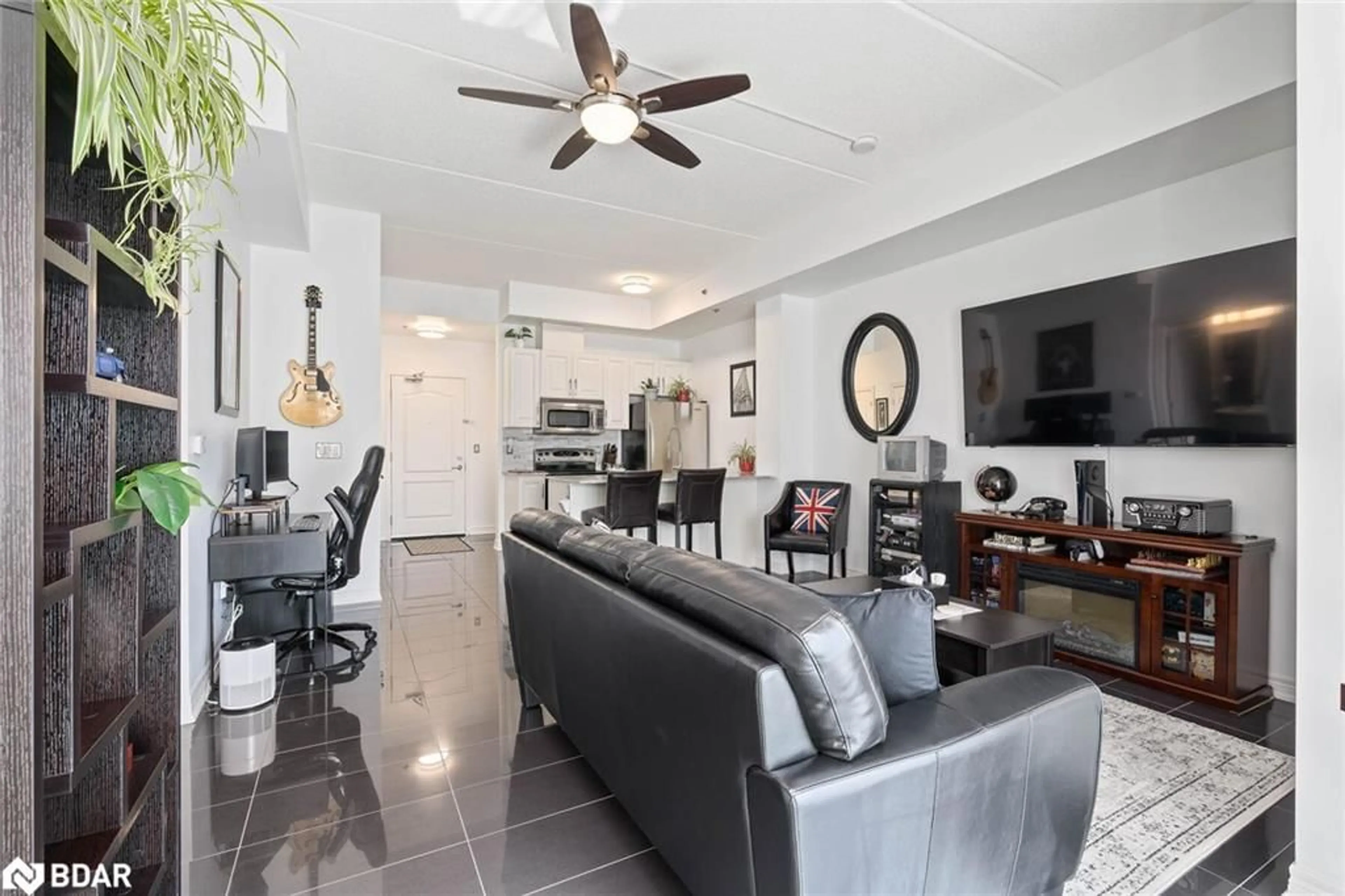 Living room with furniture, ceramic/tile floor for 1421 Costigan Rd #614, Milton Ontario L9T 2N4