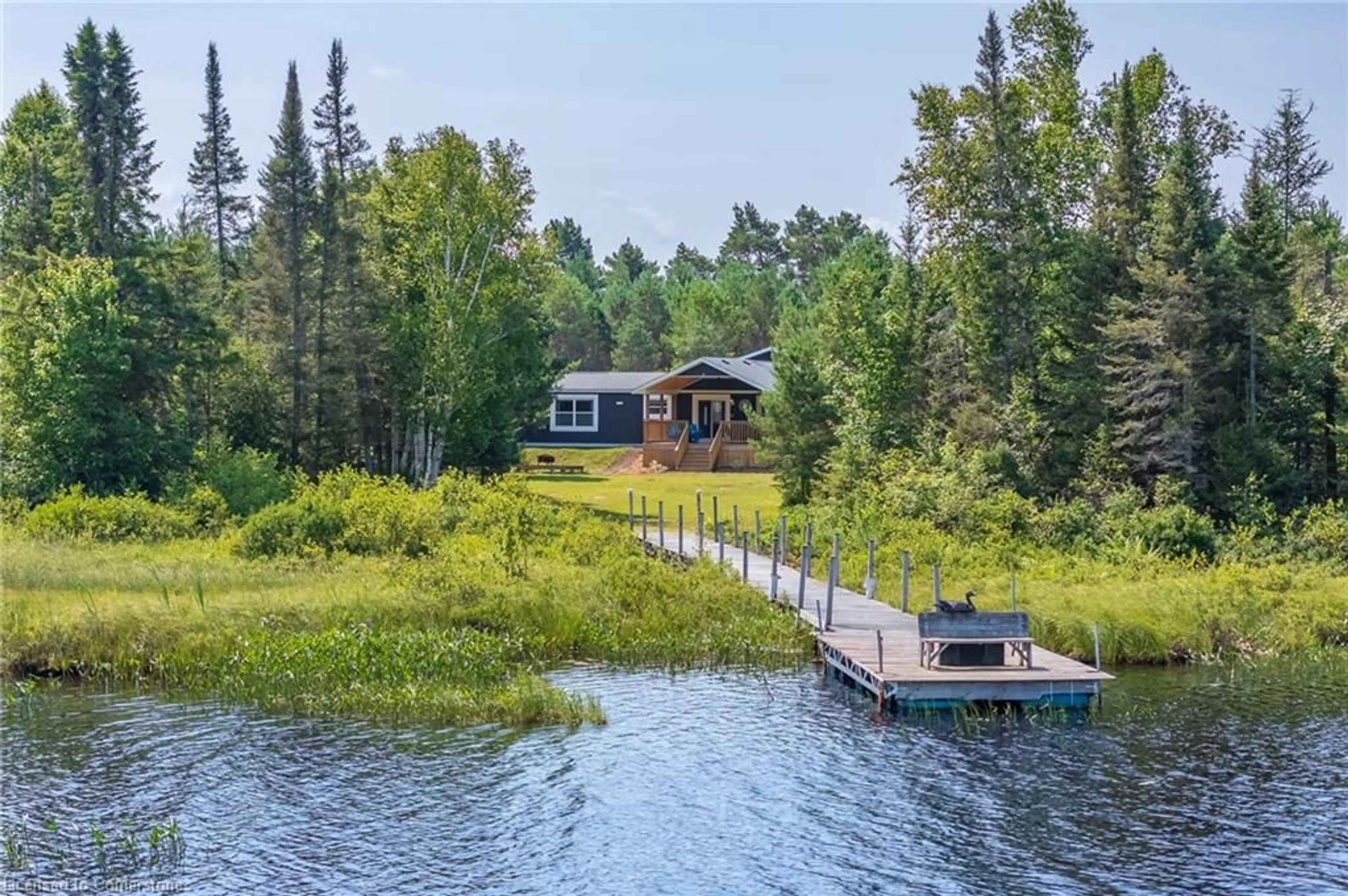 A pic from outside/outdoor area/front of a property/back of a property/a pic from drone, water/lake/river/ocean view for 889 Sandhill Road Rd, Sundridge Ontario P0A 1Z0