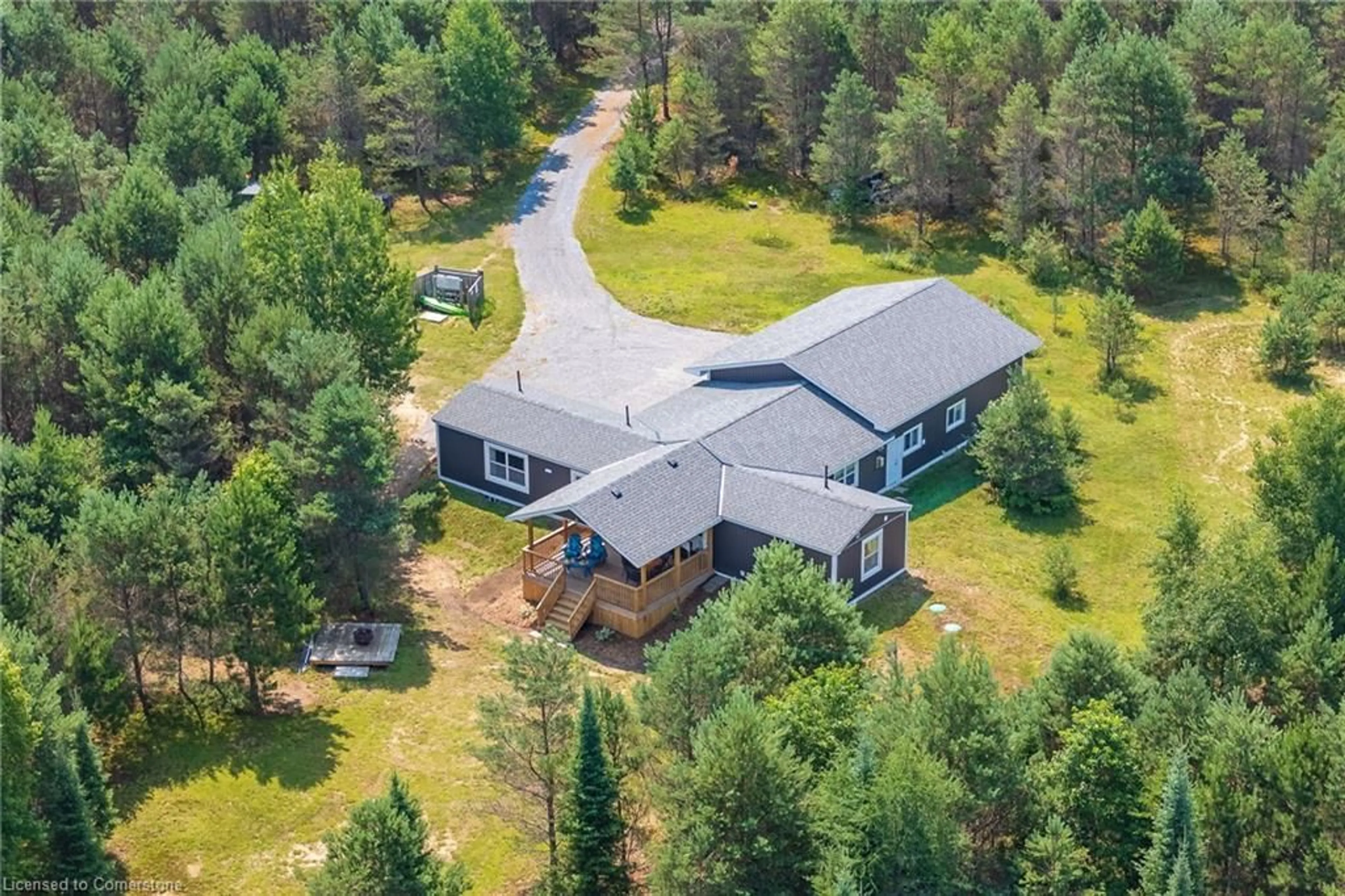 A pic from outside/outdoor area/front of a property/back of a property/a pic from drone, forest/trees view for 889 Sandhill Road Rd, Sundridge Ontario P0A 1Z0