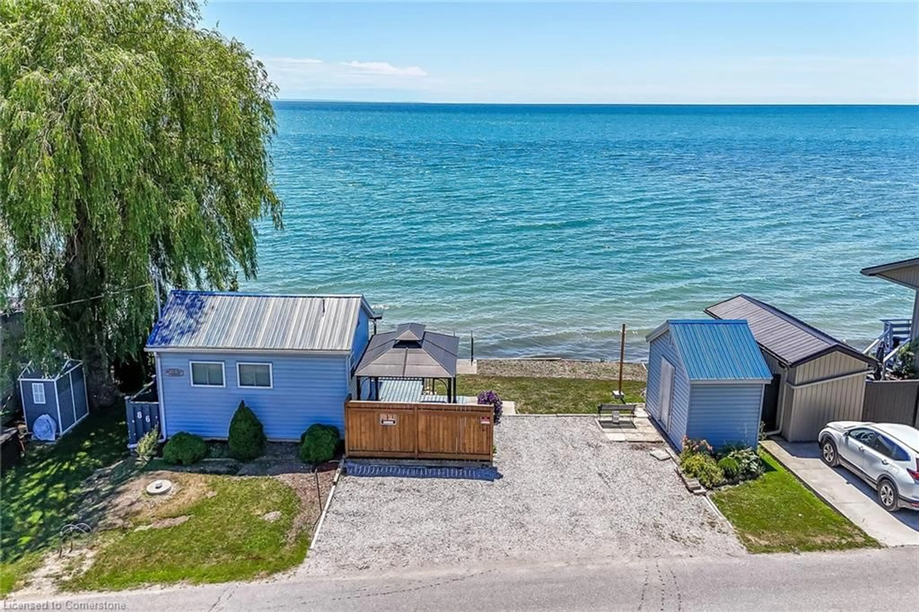 A pic from outside/outdoor area/front of a property/back of a property/a pic from drone, water/lake/river/ocean view for 86 Lakeshore Rd, Selkirk Ontario N0A 1P0