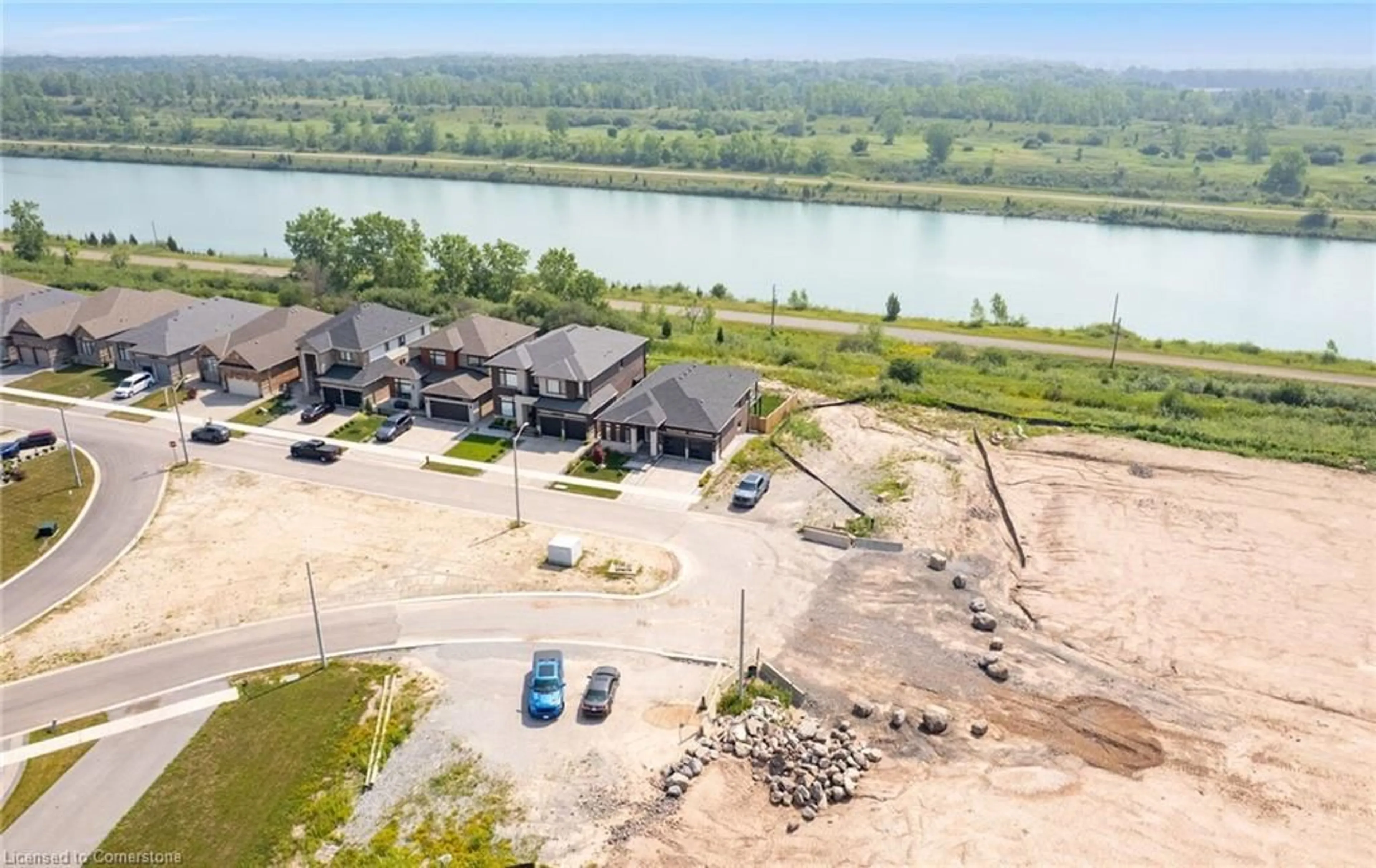 A pic from outside/outdoor area/front of a property/back of a property/a pic from drone, water/lake/river/ocean view for 296 Shoreview Dr, Welland Ontario L3B 0H3