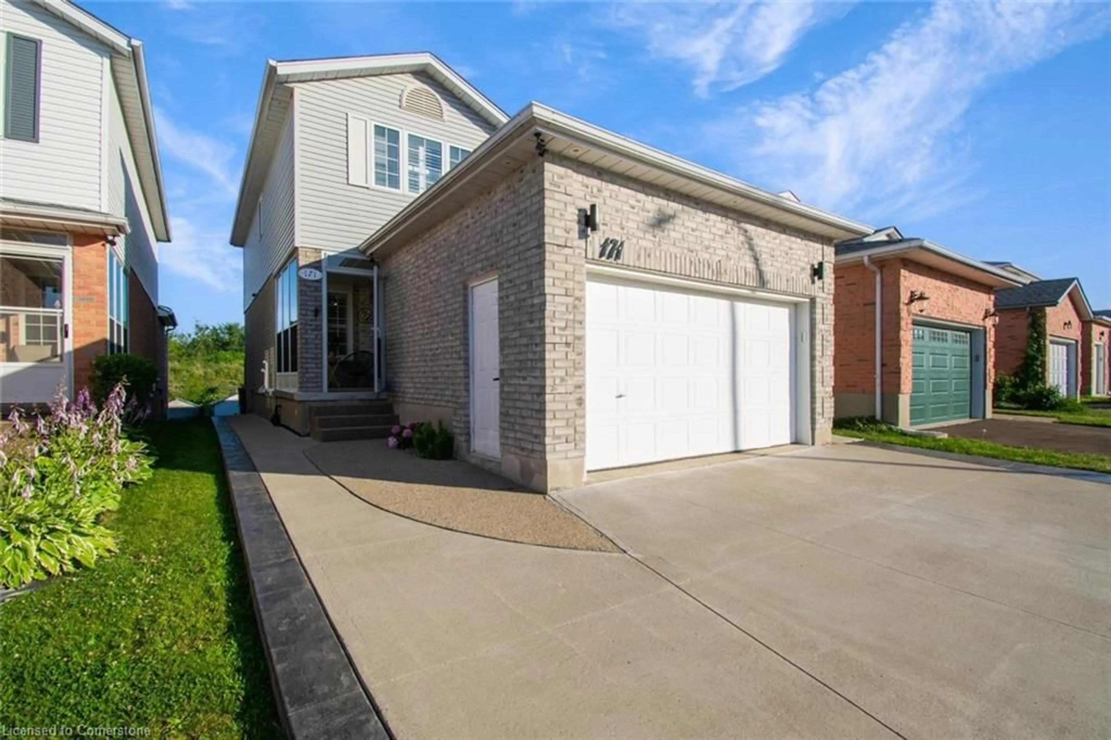 Home with brick exterior material, street for 171 Resurrection Dr, Kitchener Ontario N2N 3H1