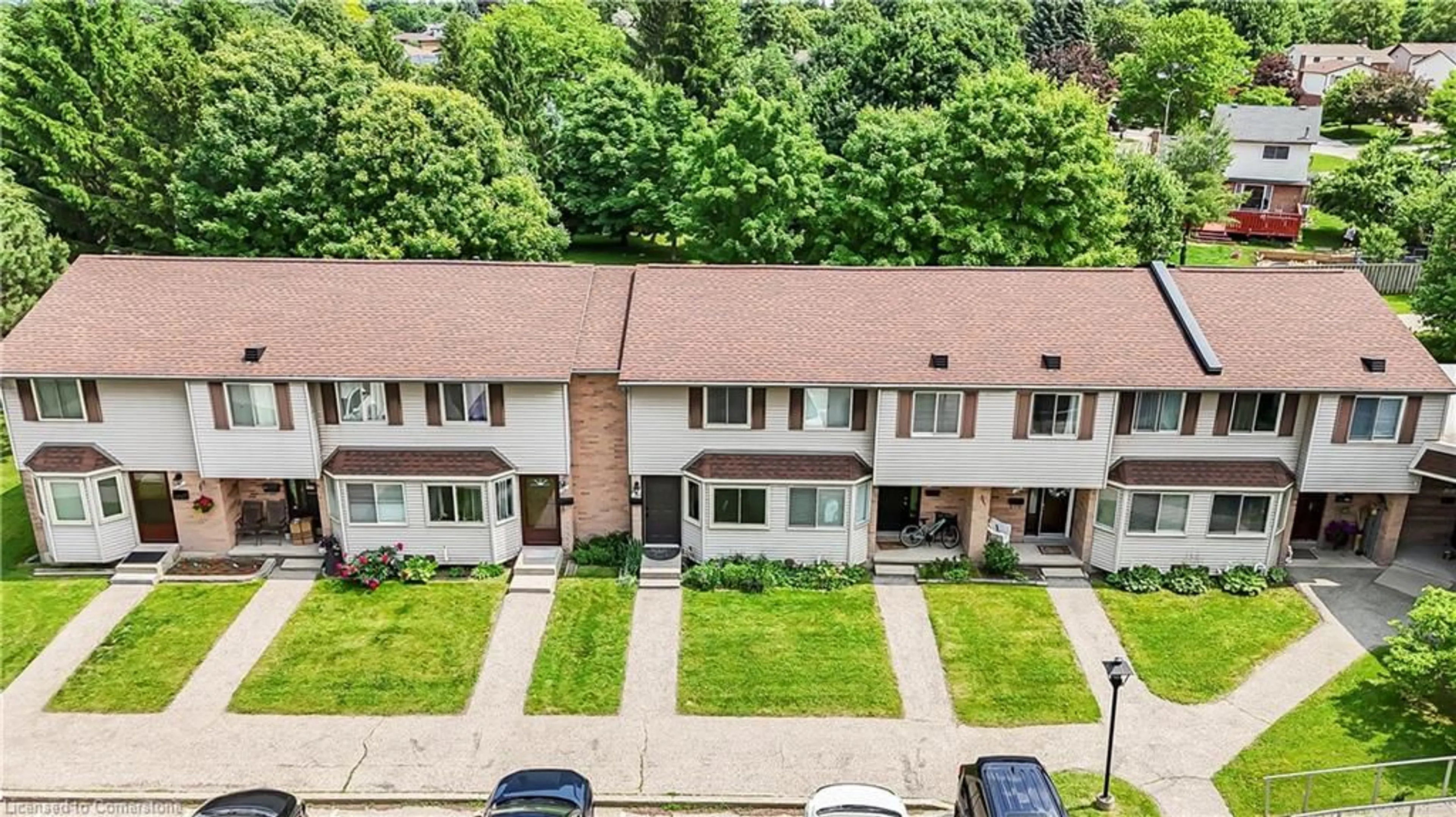 A pic from outside/outdoor area/front of a property/back of a property/a pic from drone, unknown for 750 Erinbrook Dr #14, Kitchener Ontario N2E 2S7