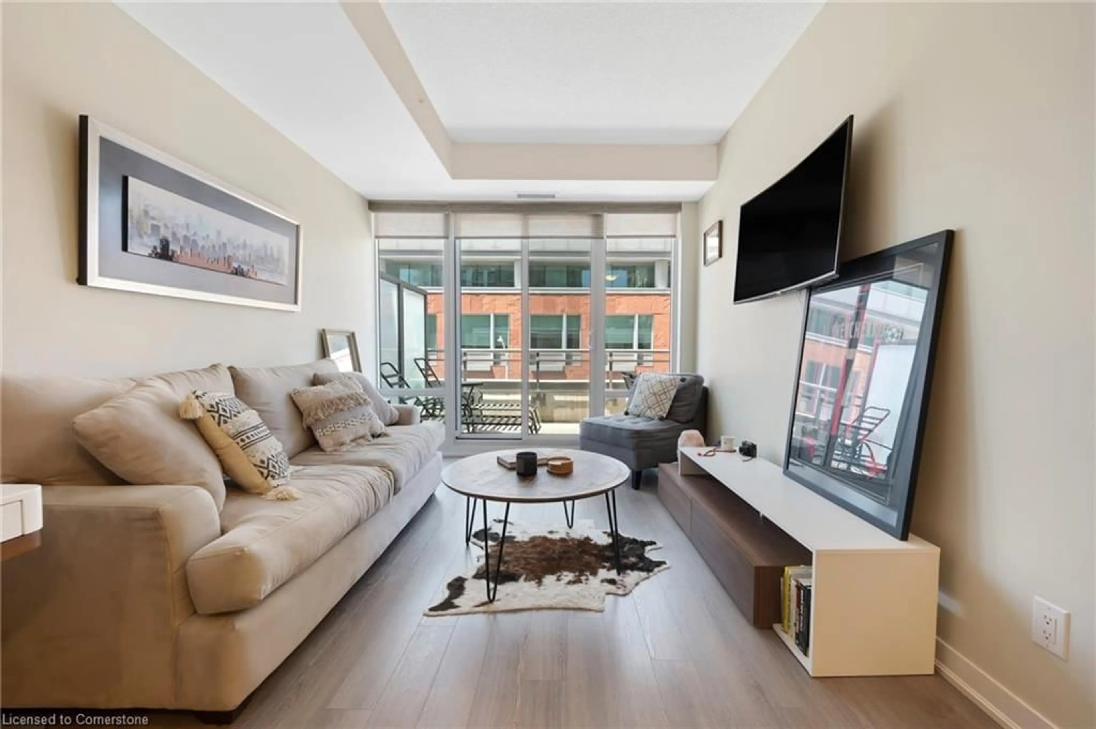 Living room with furniture, unknown for 85 Duke Street West #214, Kitchener Ontario N2H 0B7