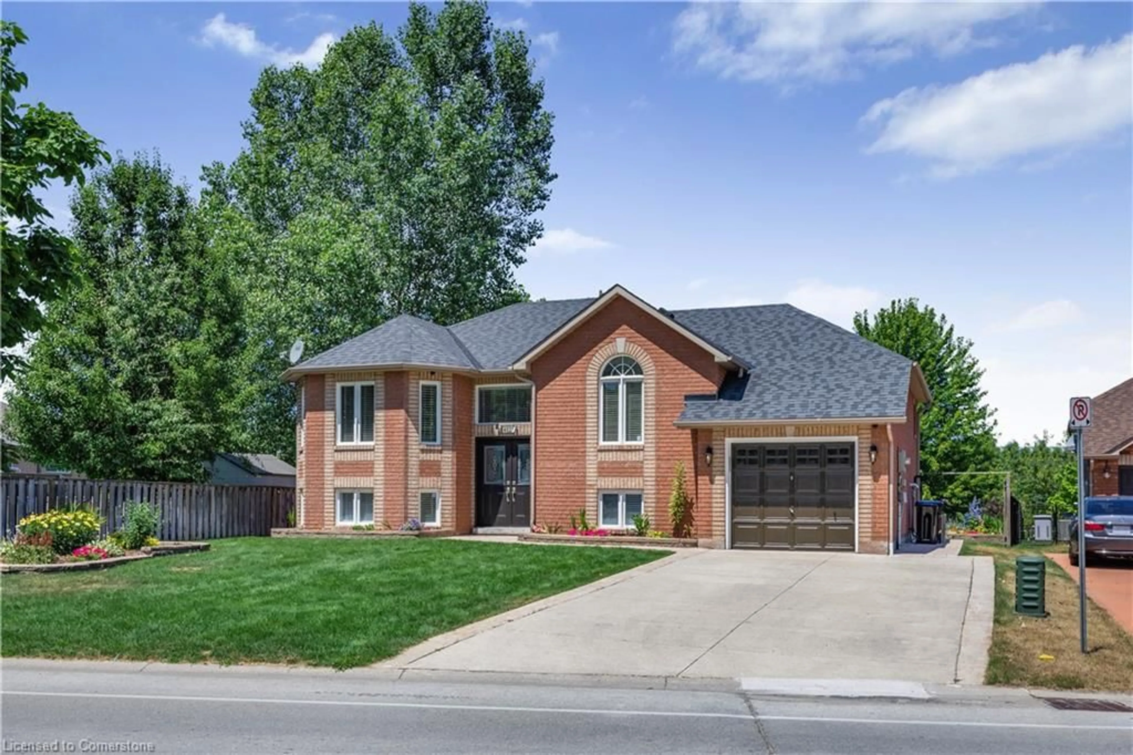 Home with brick exterior material, street for 402 Ramblewood Dr, Wasaga Beach Ontario L9Z 2N9