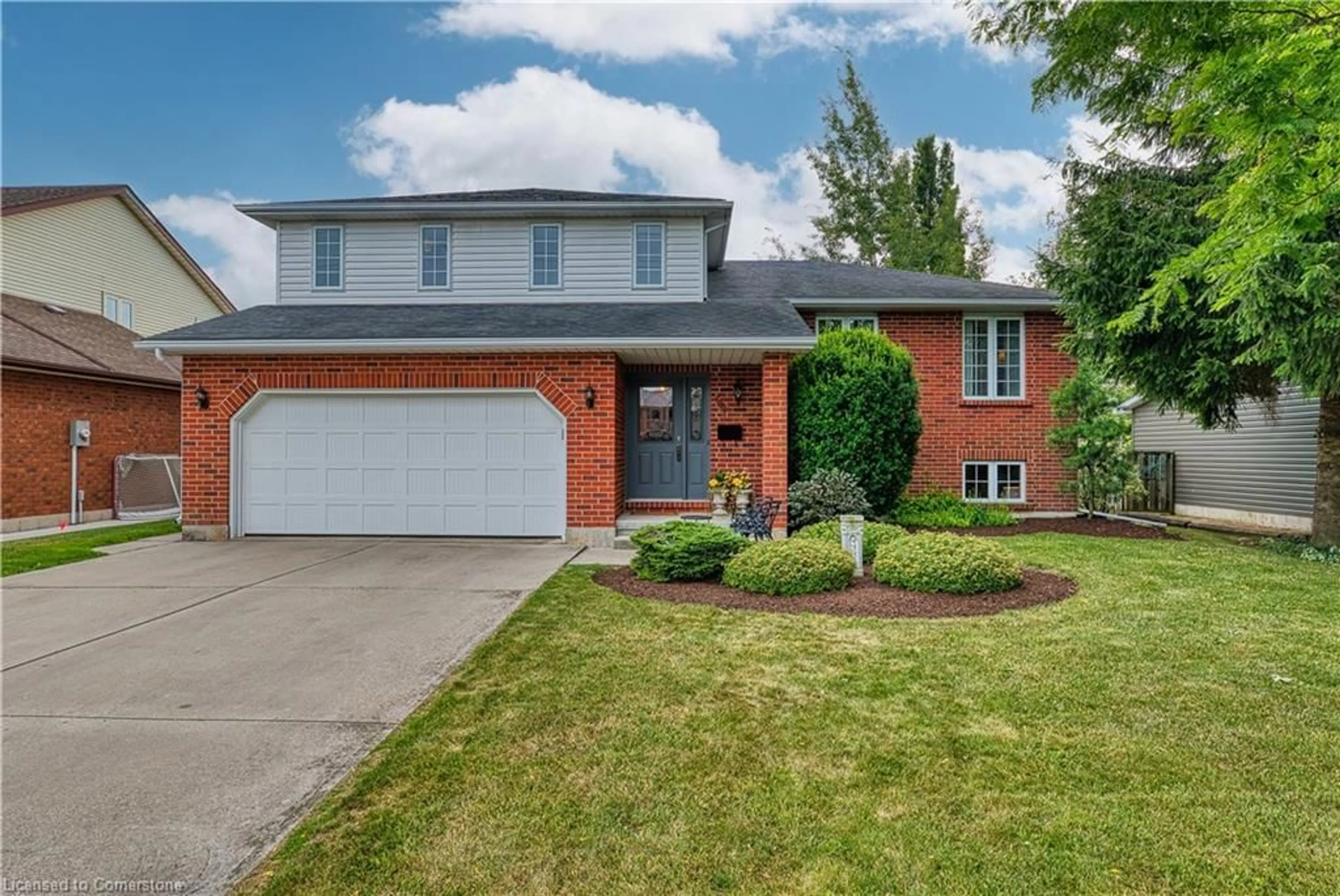 Home with brick exterior material, street for 596 Elm Ave, Listowel Ontario N4W 3G2