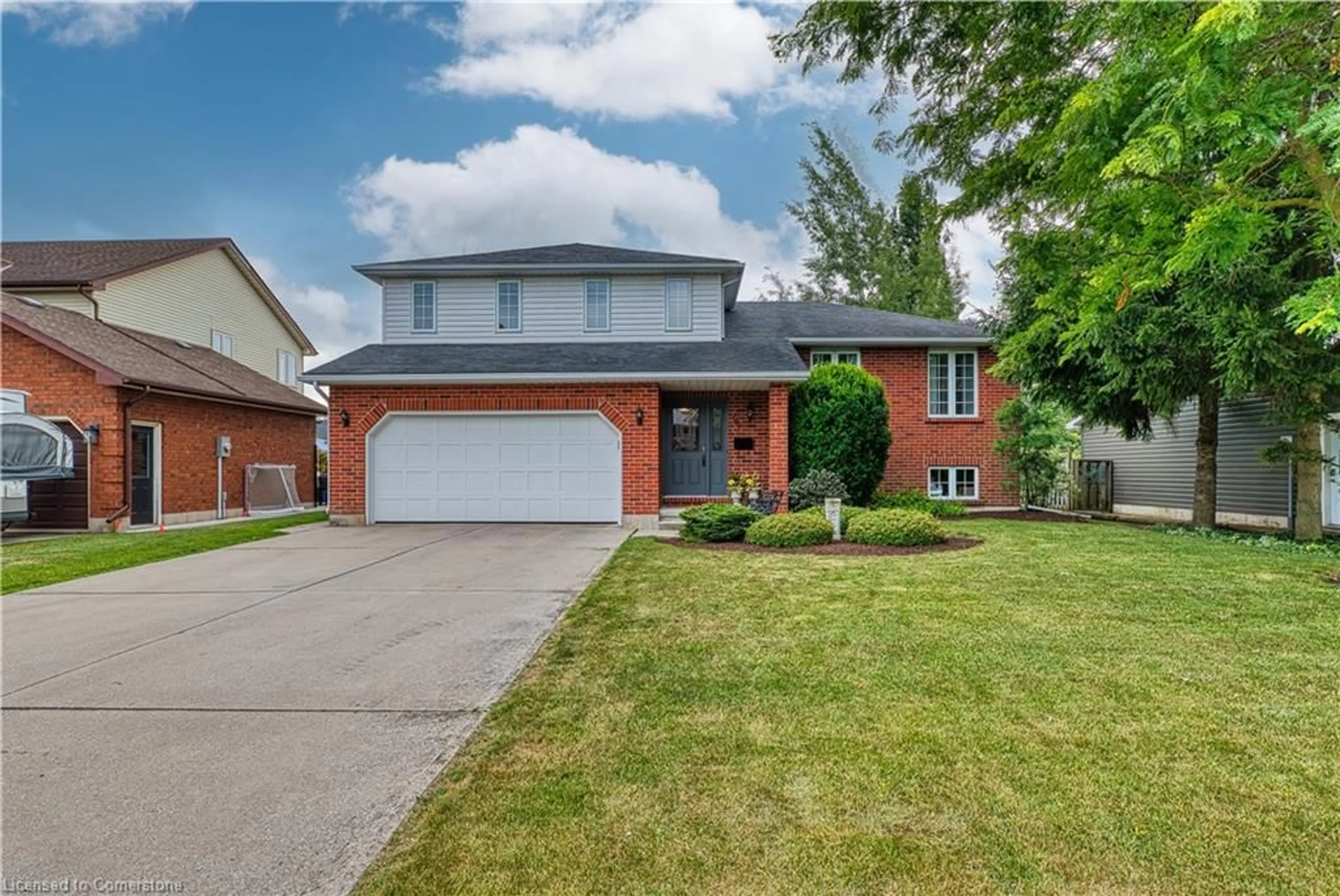 Home with brick exterior material, street for 596 Elm Ave, Listowel Ontario N4W 3G2