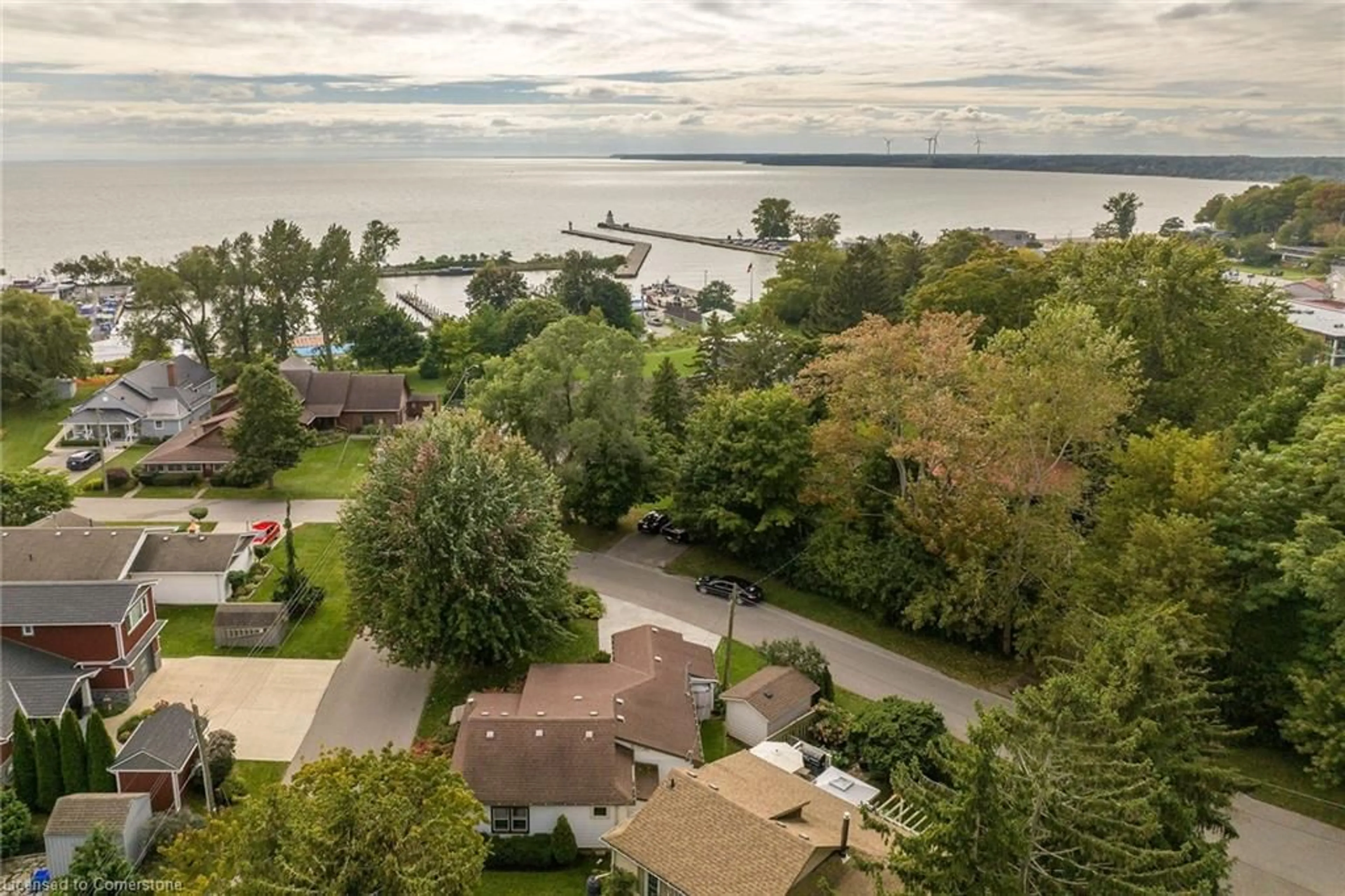 A pic from outside/outdoor area/front of a property/back of a property/a pic from drone, water/lake/river/ocean view for 16 Broad St, Port Dover Ontario N0A 1N7