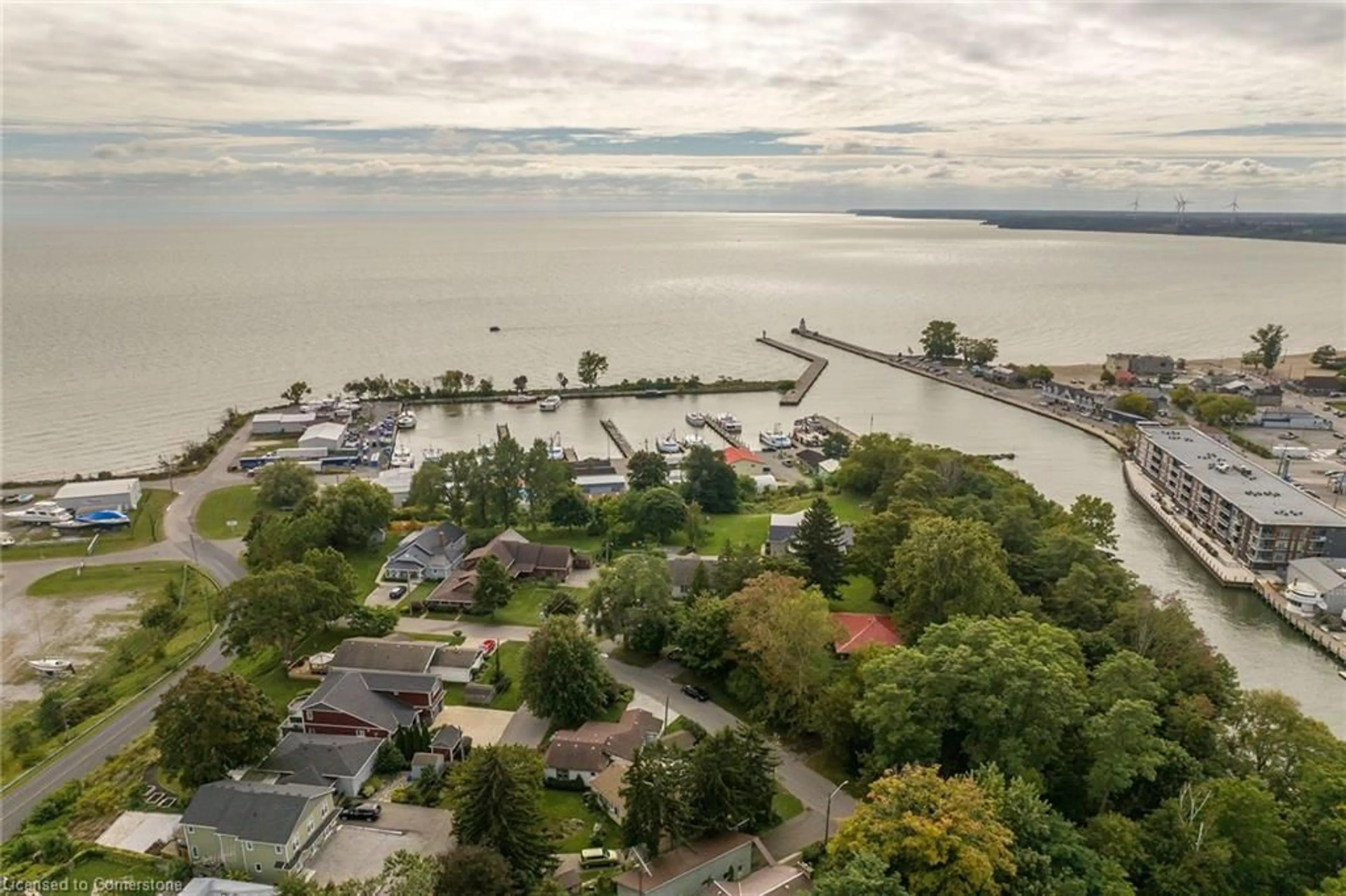 A pic from outside/outdoor area/front of a property/back of a property/a pic from drone, water/lake/river/ocean view for 16 Broad St, Port Dover Ontario N0A 1N7