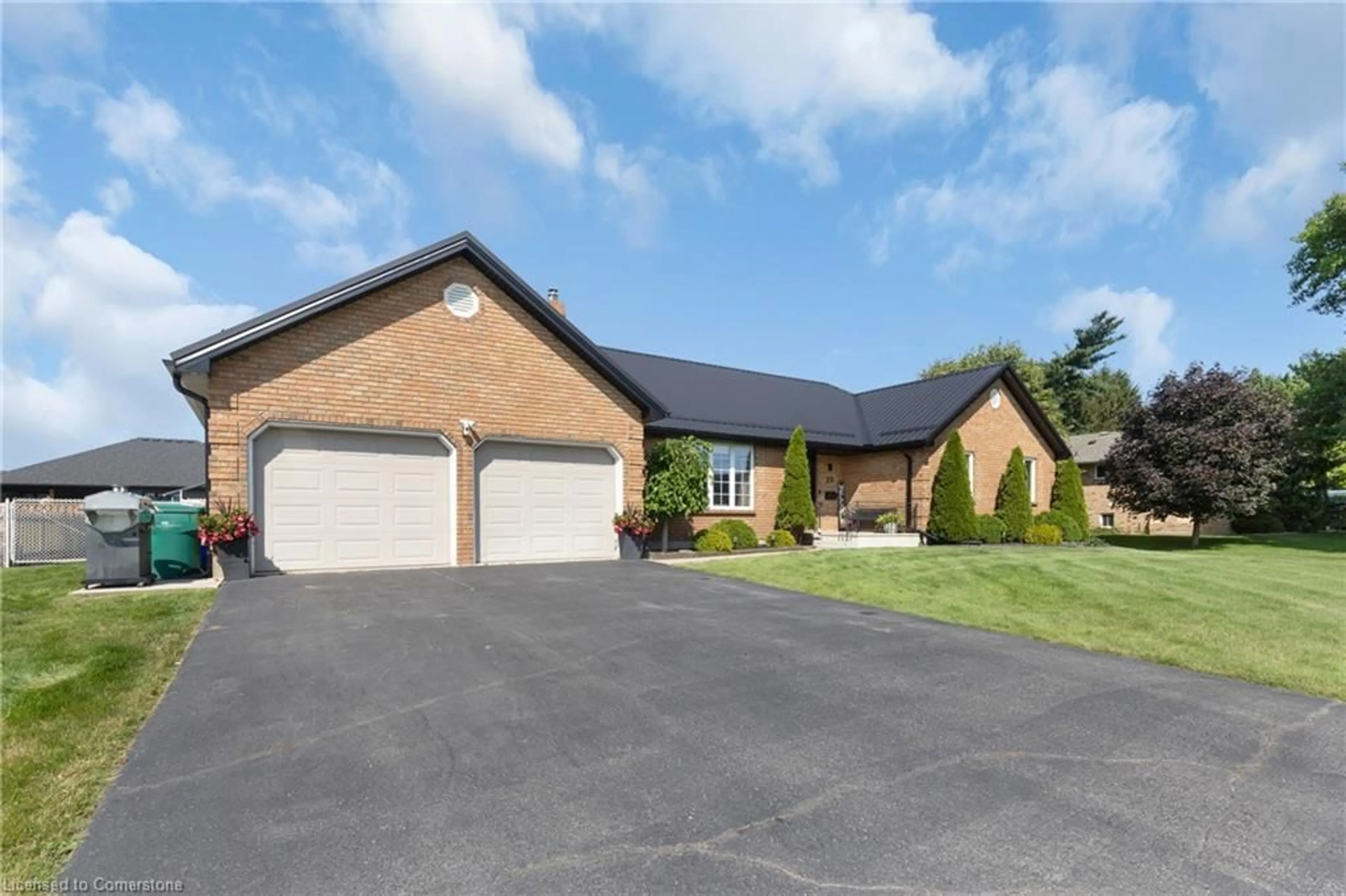 Home with brick exterior material, street for 25 Mc Intosh Dr, Delhi Ontario N4B 2V3