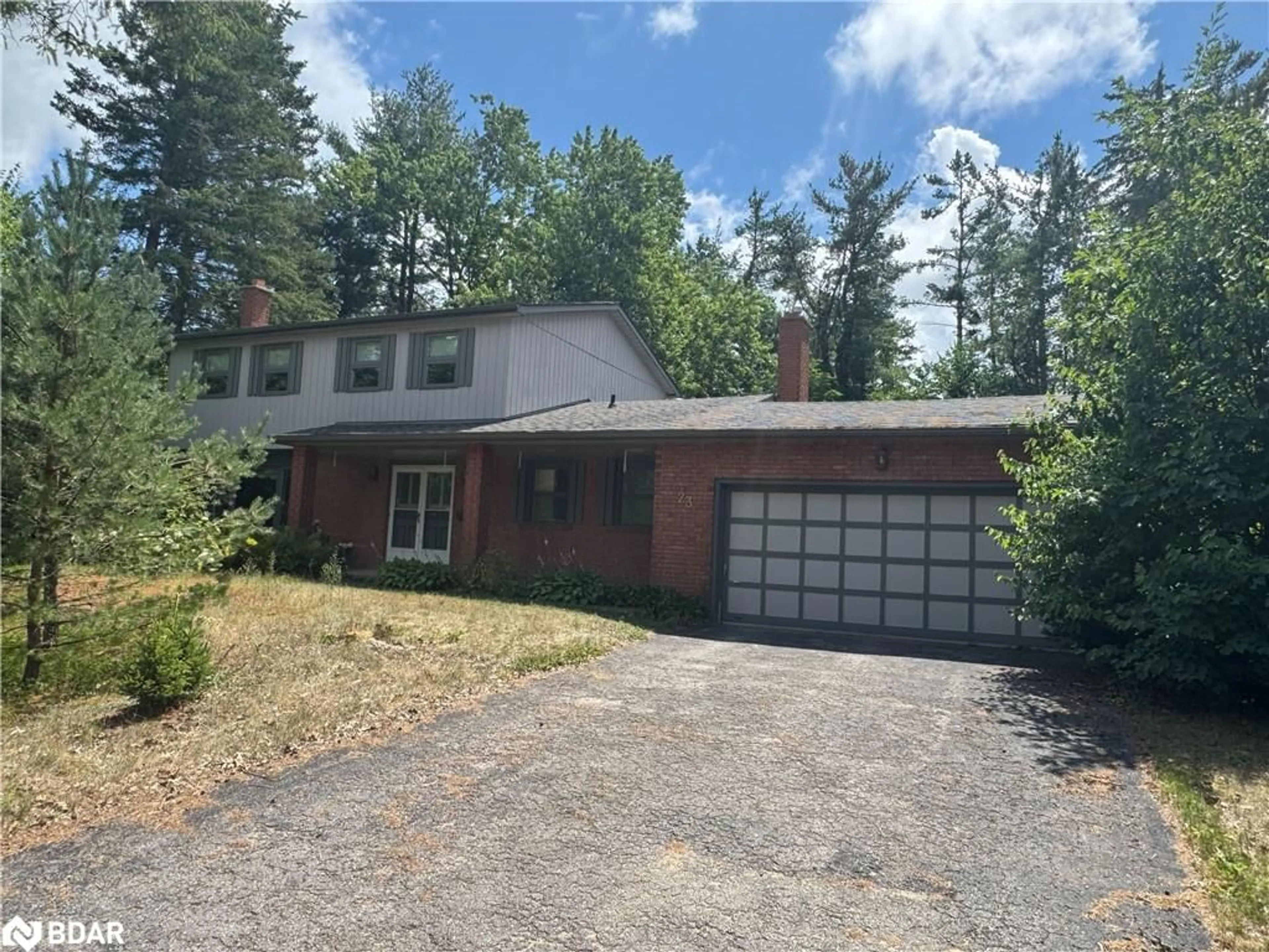 Home with brick exterior material, street for 23 Cedar Creek Rd, Midhurst Ontario L0L 1X0