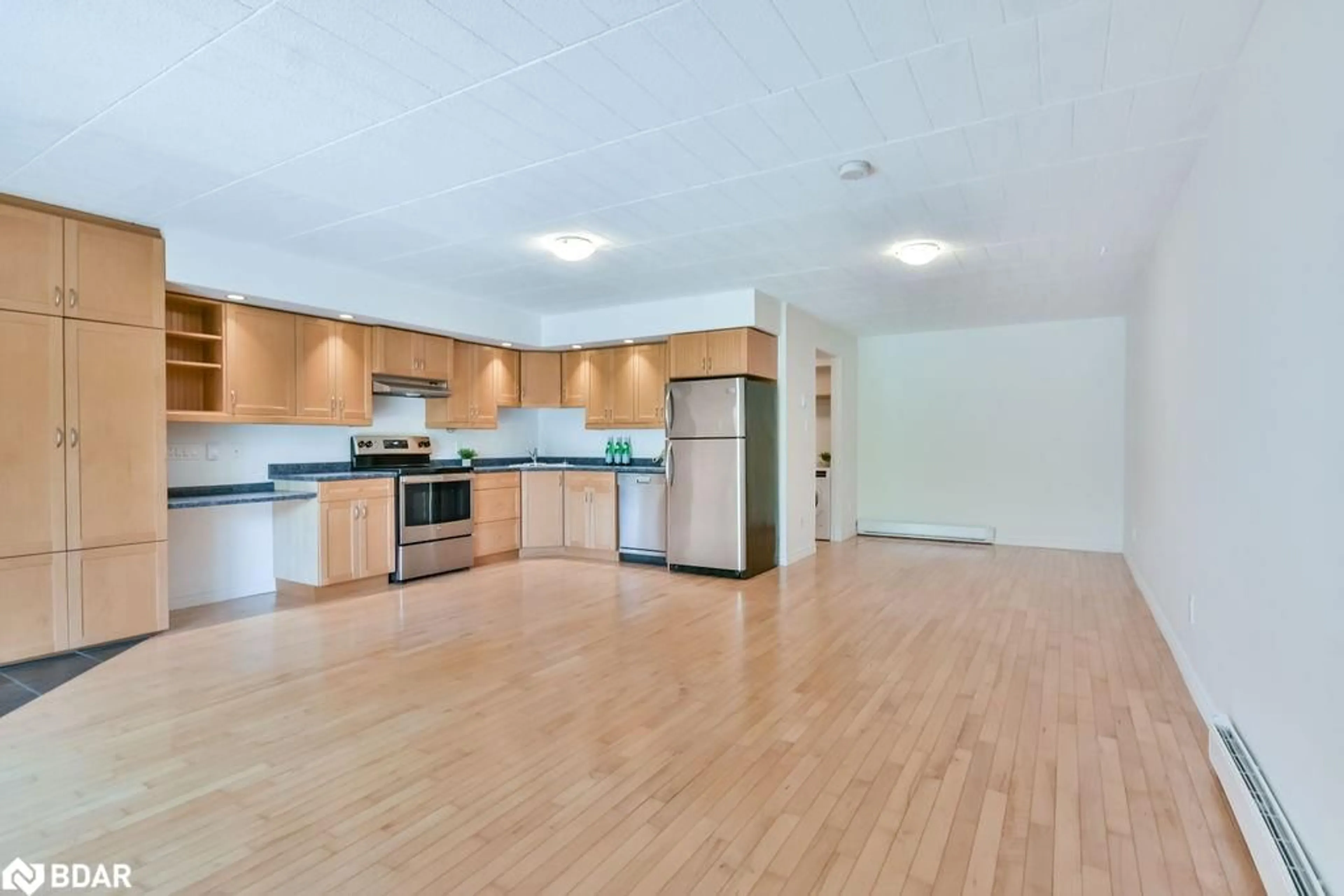 Open concept kitchen, unknown for 1102 Horseshoe Valley Rd #126, Barrie Ontario L4M 4Y8