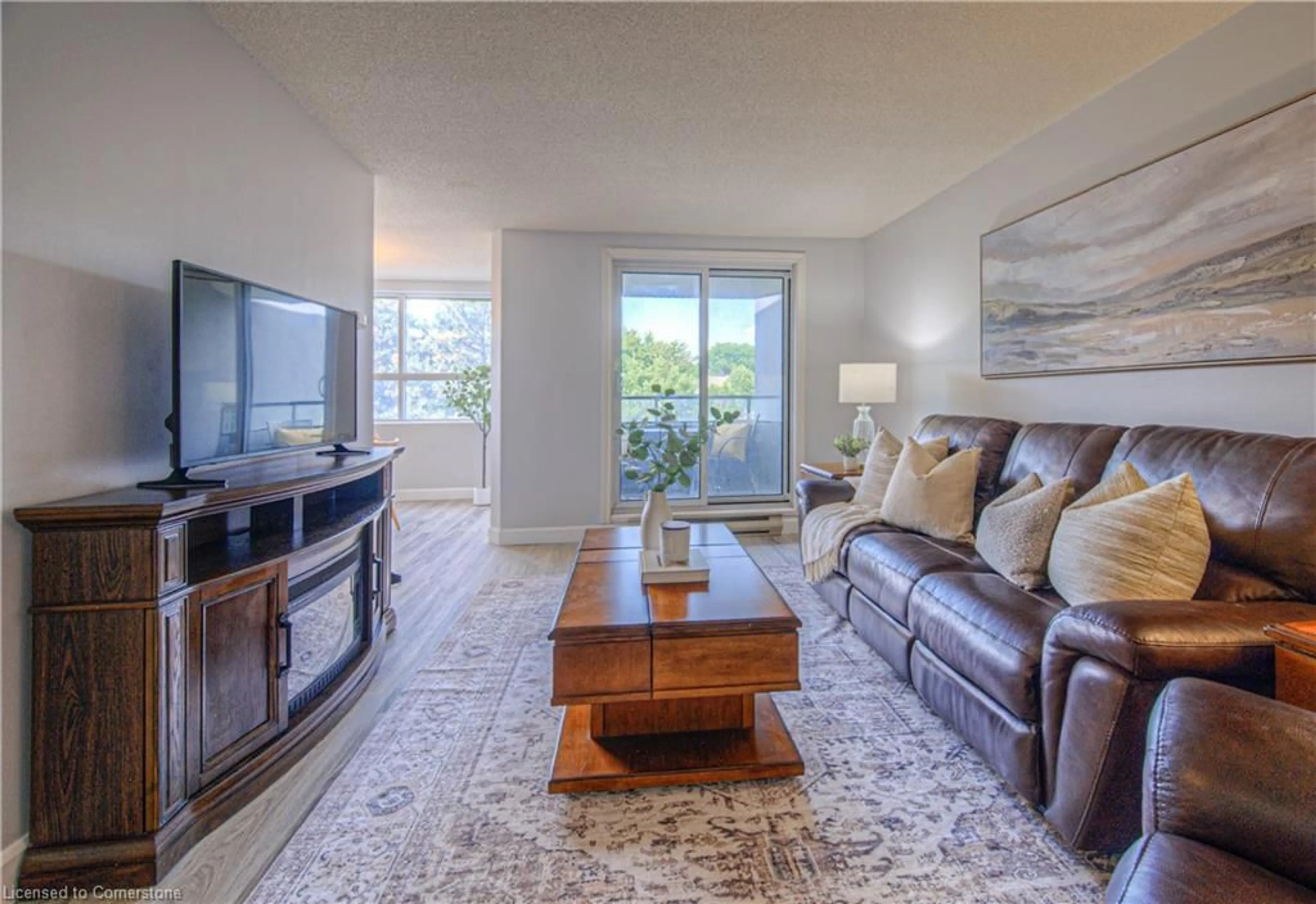 Living room with furniture, unknown for 200 Jamieson Pky #211, Cambridge Ontario N3C 4B5
