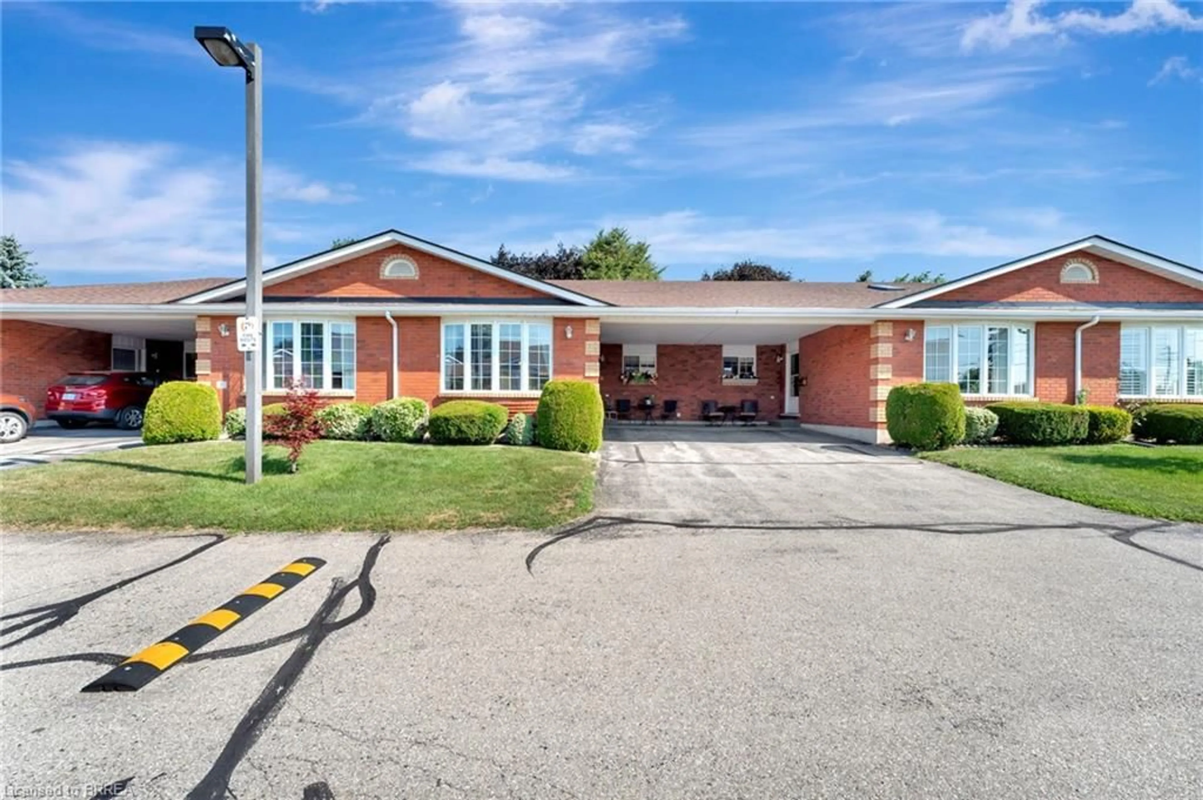 Home with brick exterior material, street for 20 Courtland Dr #9, Brantford Ontario N3R 7Y2