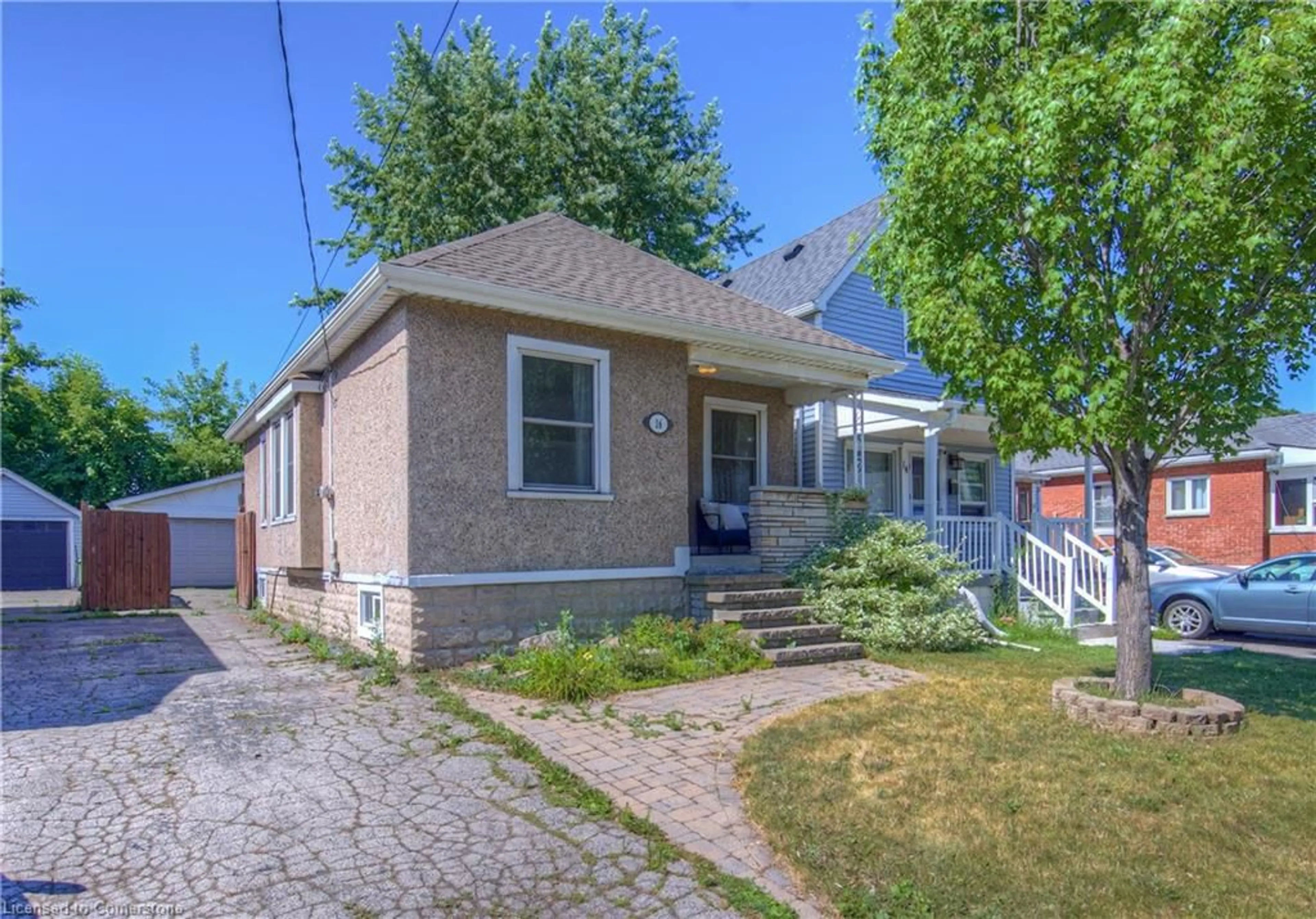 Home with brick exterior material, street for 16 Newlands Ave, Hamilton Ontario L8H 2T5