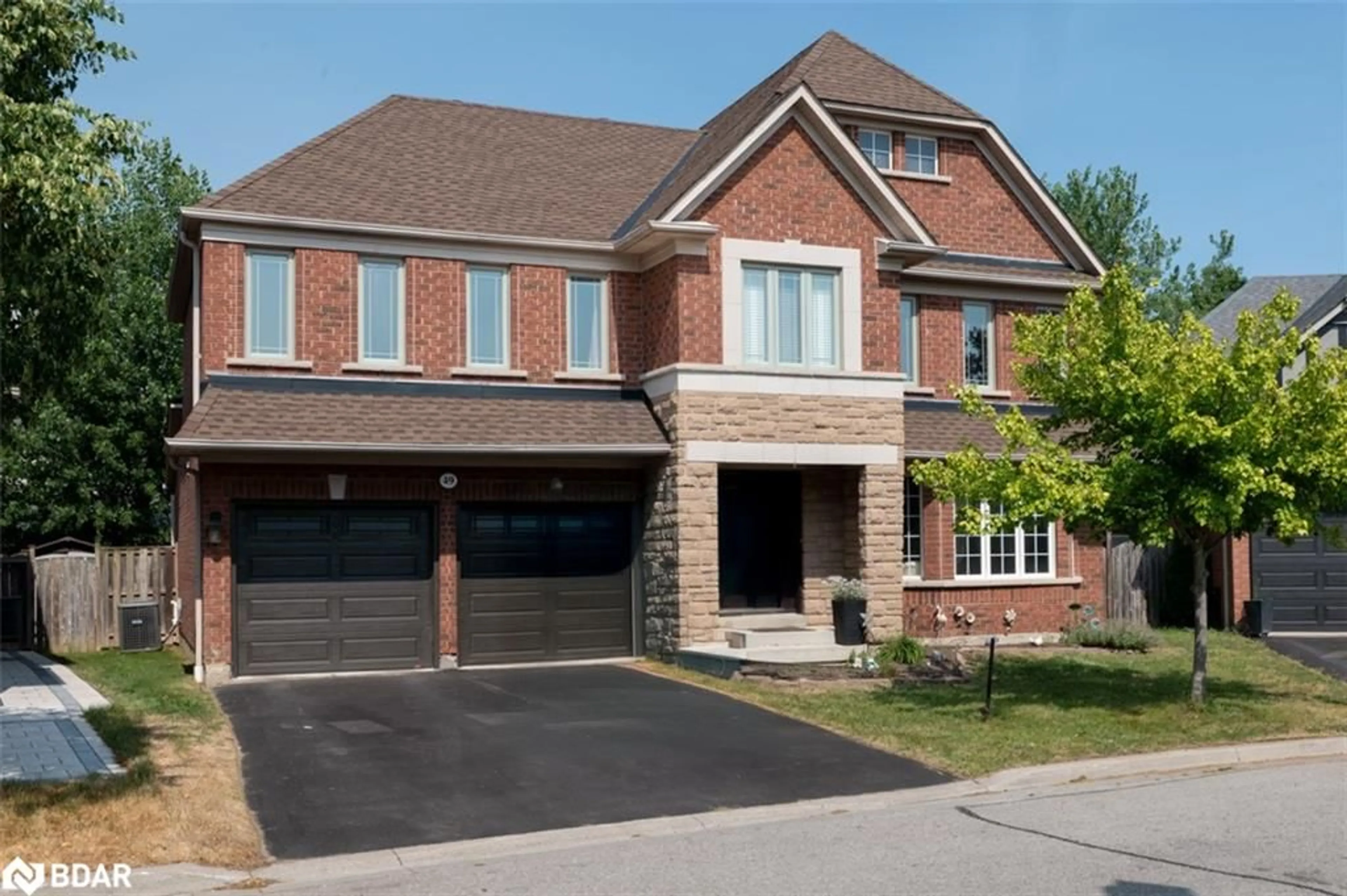 Home with brick exterior material, street for 49 Montebello Cres, Ajax Ontario L1T 4P2