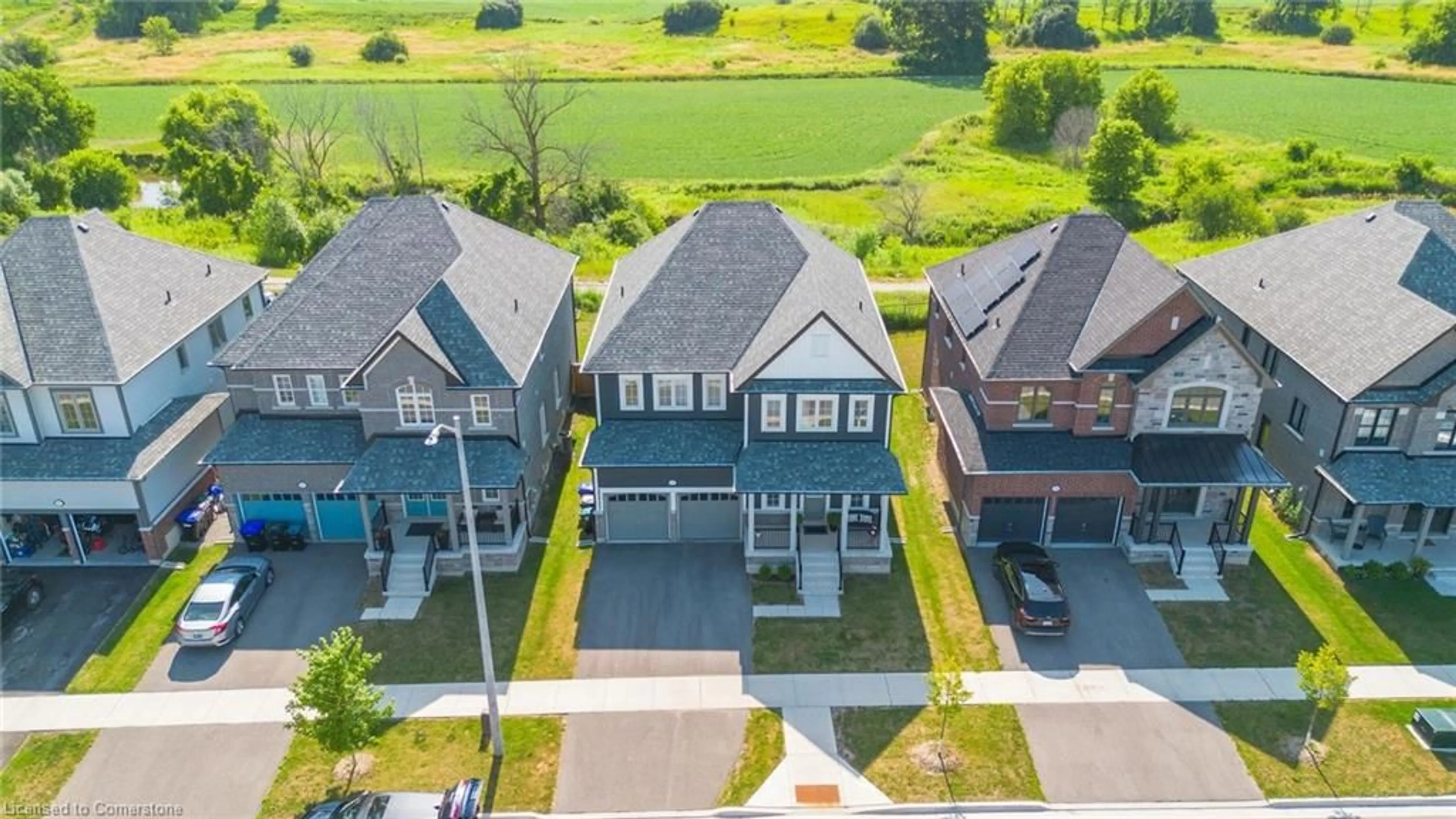 A pic from outside/outdoor area/front of a property/back of a property/a pic from drone, street for 134 Strachan Trail, New Tecumseth Ontario L0G 1A0