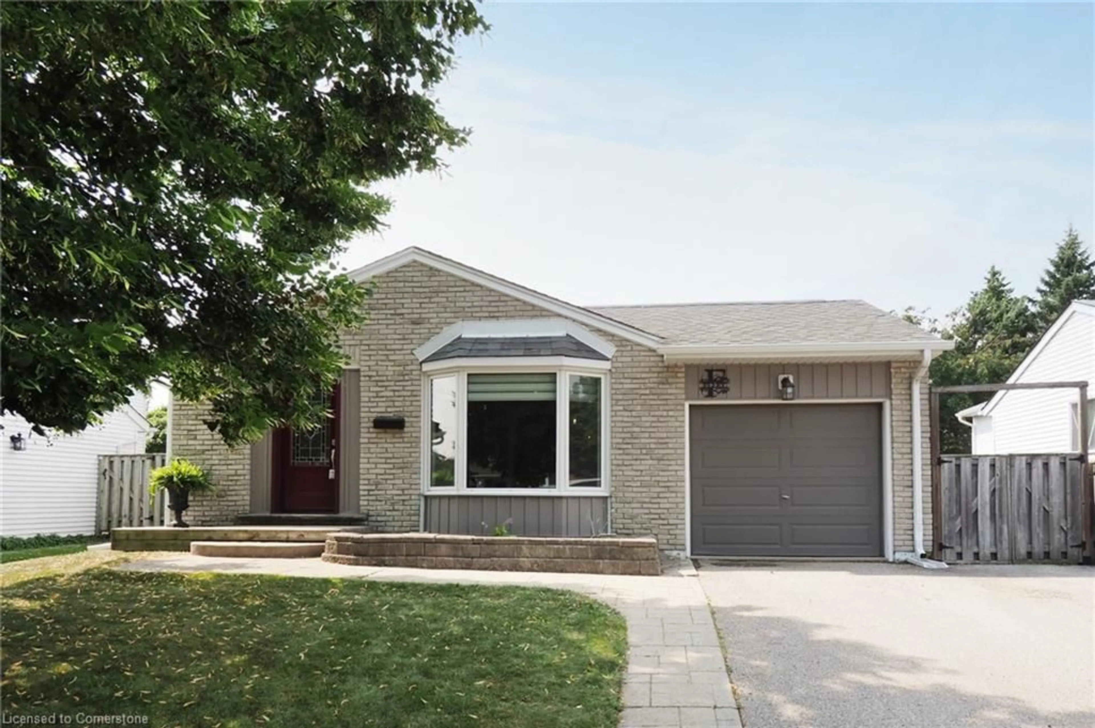 Home with brick exterior material, street for 462 Driftwood Dr, Kitchener Ontario N2N 1S6