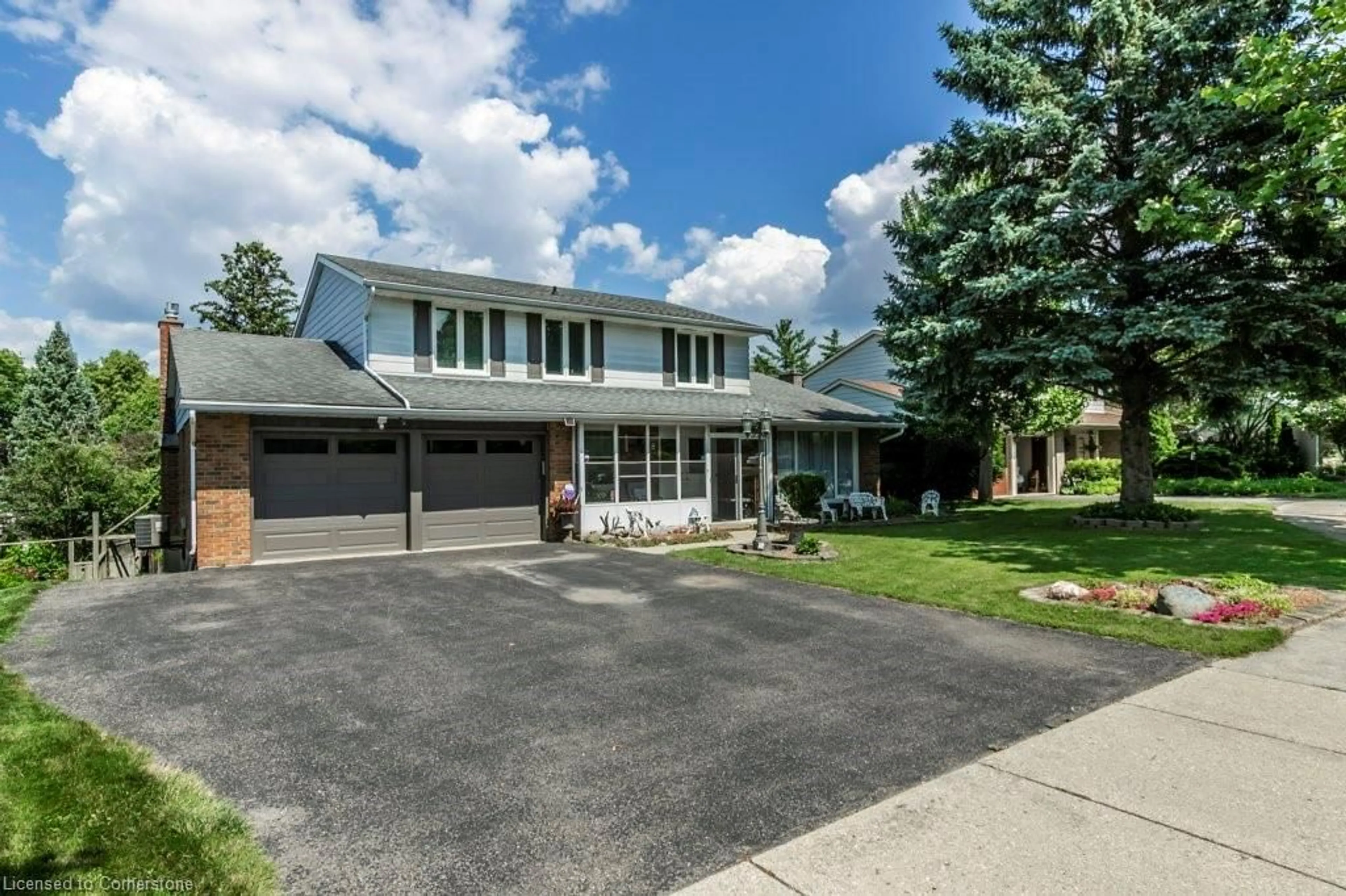 Home with brick exterior material, street for 68 Ridgeview Cres, Waterloo Ontario N2L 2P9