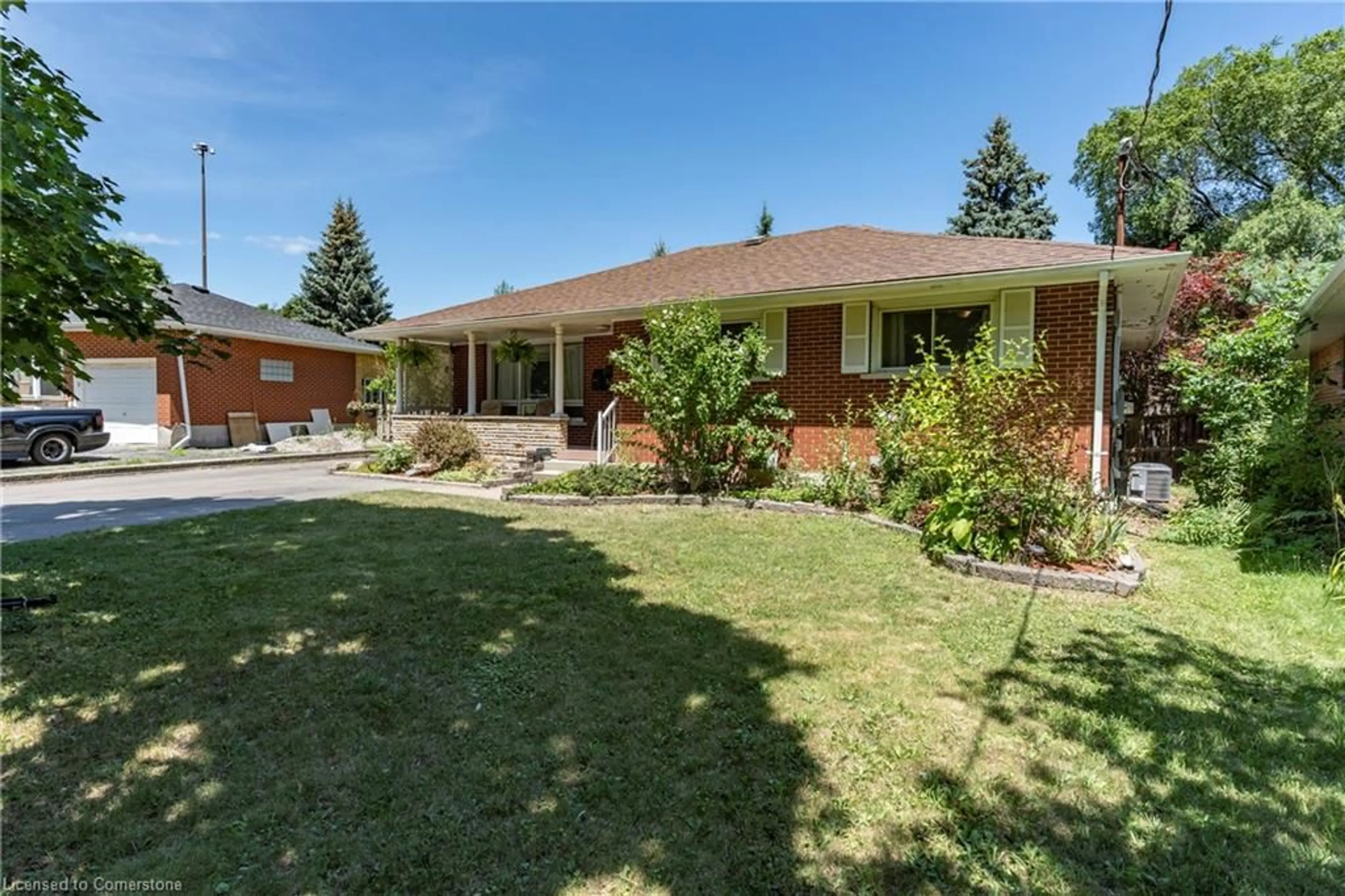 Home with brick exterior material, street for 104 Boniface Ave, Kitchener Ontario N2C 1L9