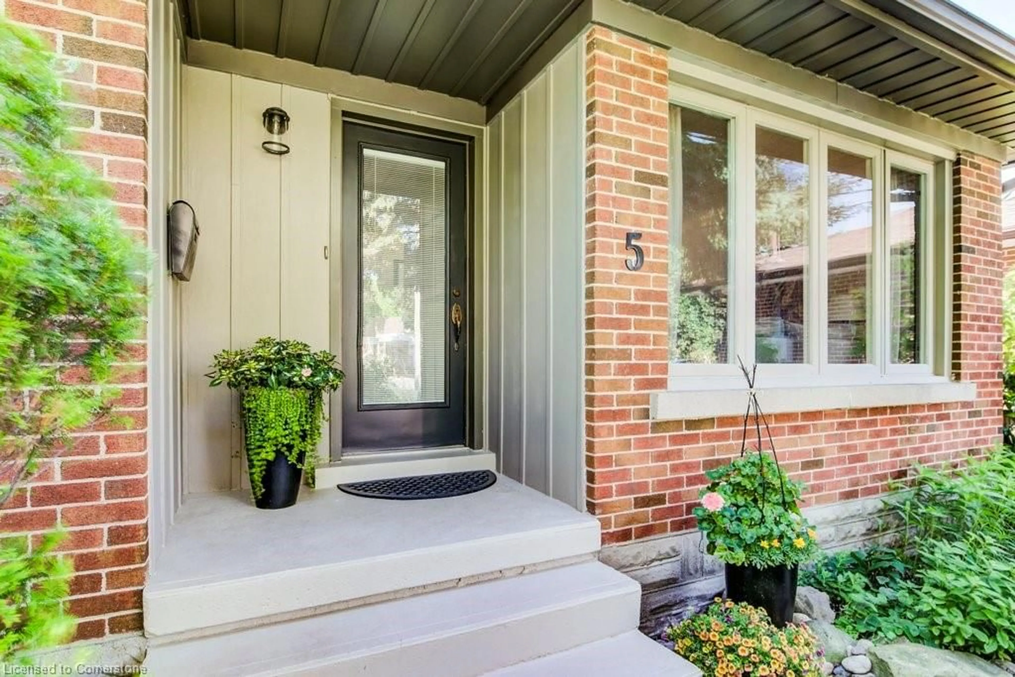 Home with brick exterior material, street for 5 Cote Dr, Guelph Ontario N1E 1Z2