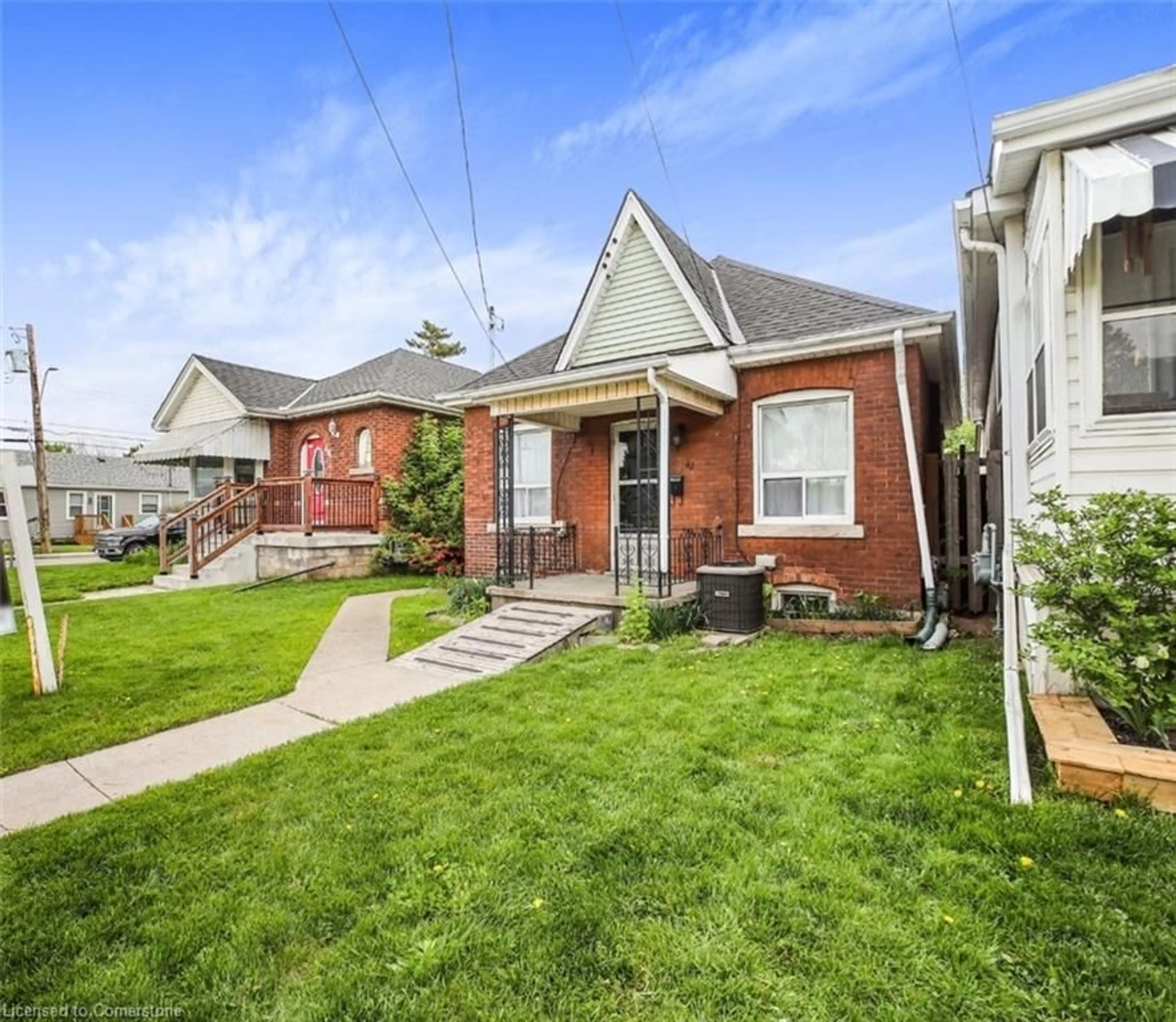 Home with brick exterior material, street for 42 Ellis Ave, Hamilton Ontario L8H 4L7